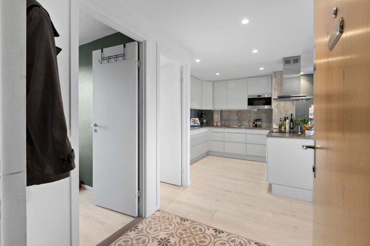 En lys og hyggelig entre som ønsker velkommen! Galleribilde