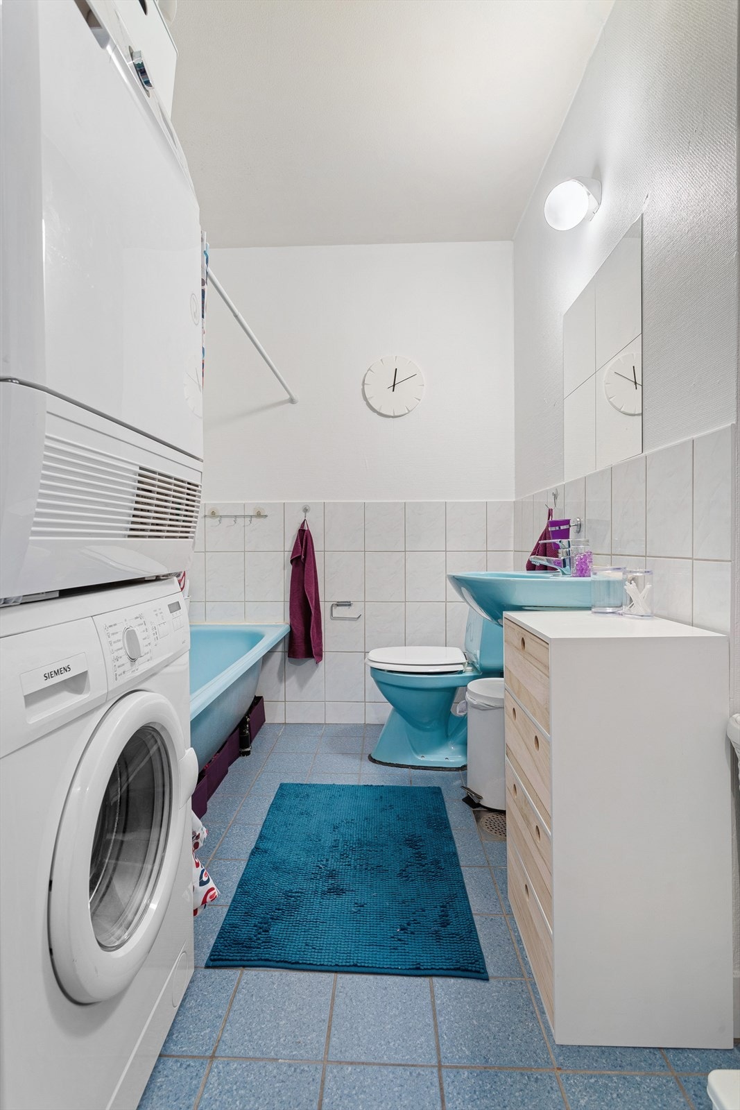 Badet har opplegg for vaskemaskin. Galleribilde