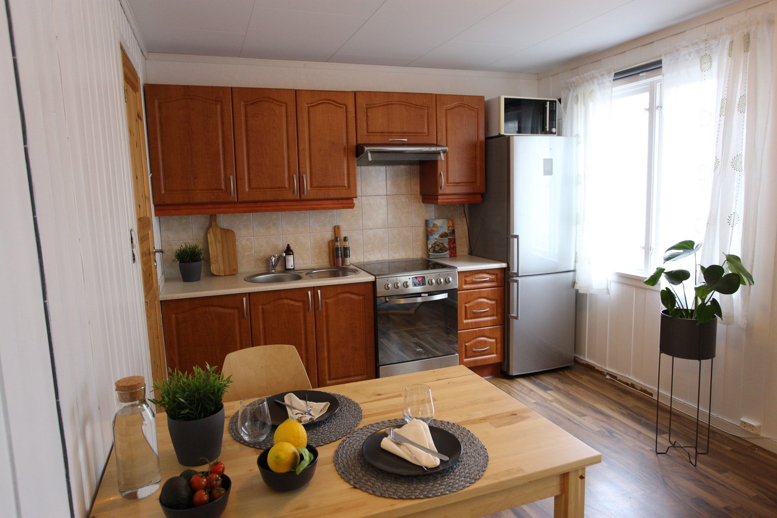 Leilighet type C - Åpen kjøkkenløsning med hyggelig spiseplass Galleribilde