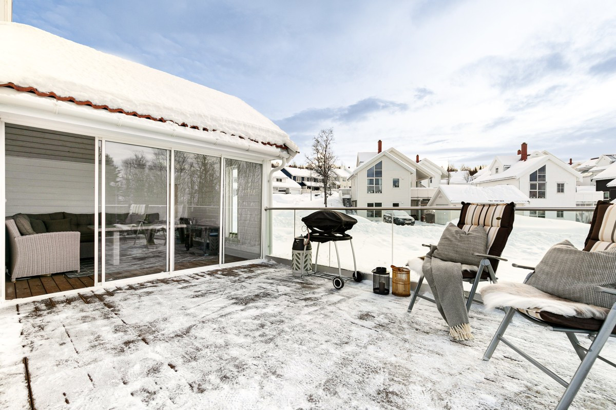 Vinterhage med skyvedører i på terrasse