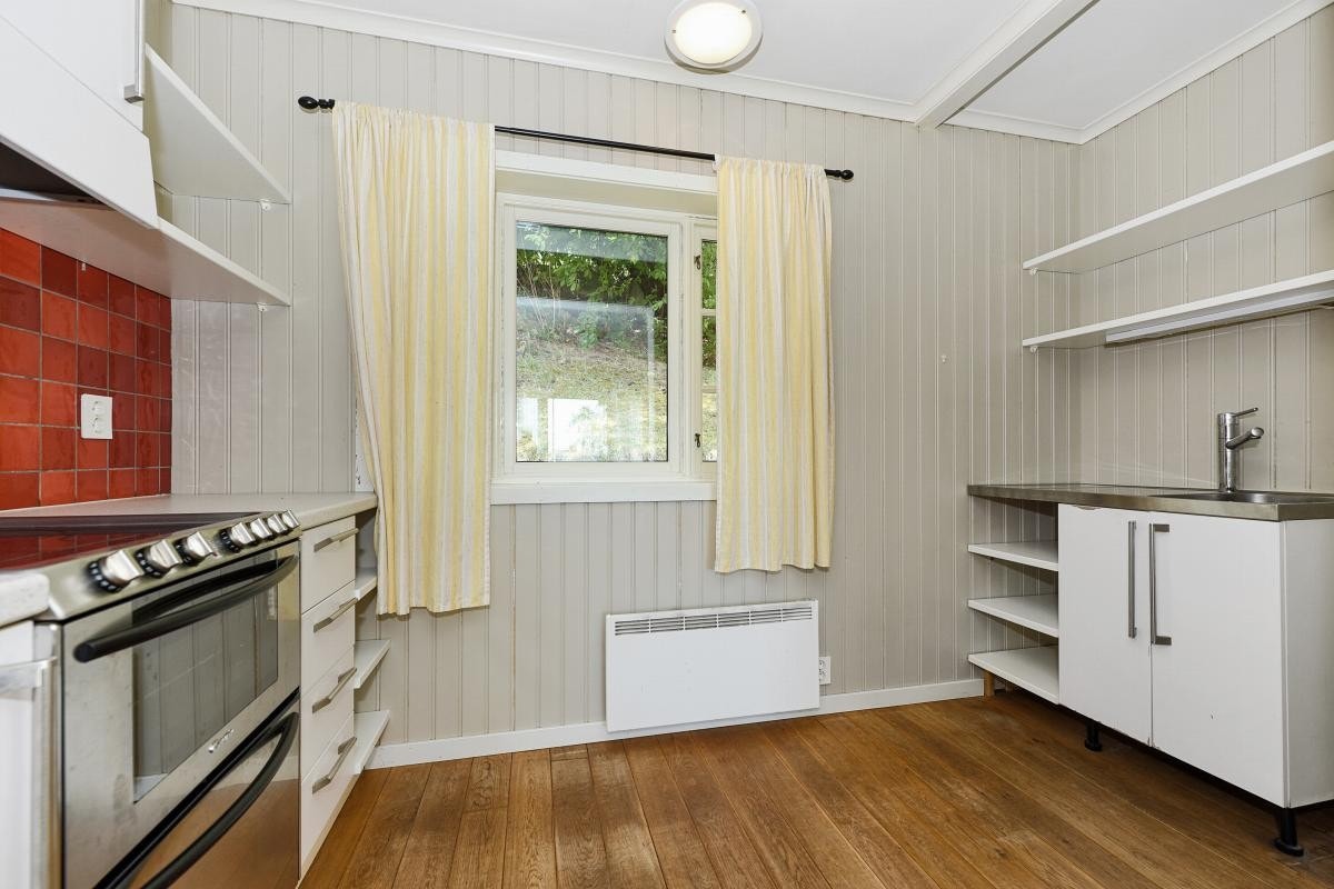 Sidebygningen inneholder stue, kjøkken, soverom og bad. Galleribilde