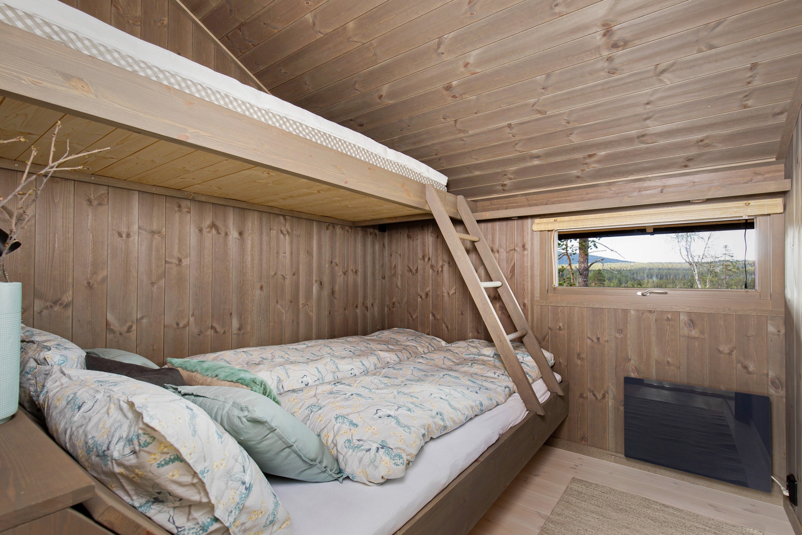 HEDDA sin karakteristiske plassbygde familiekøye. Galleribilde