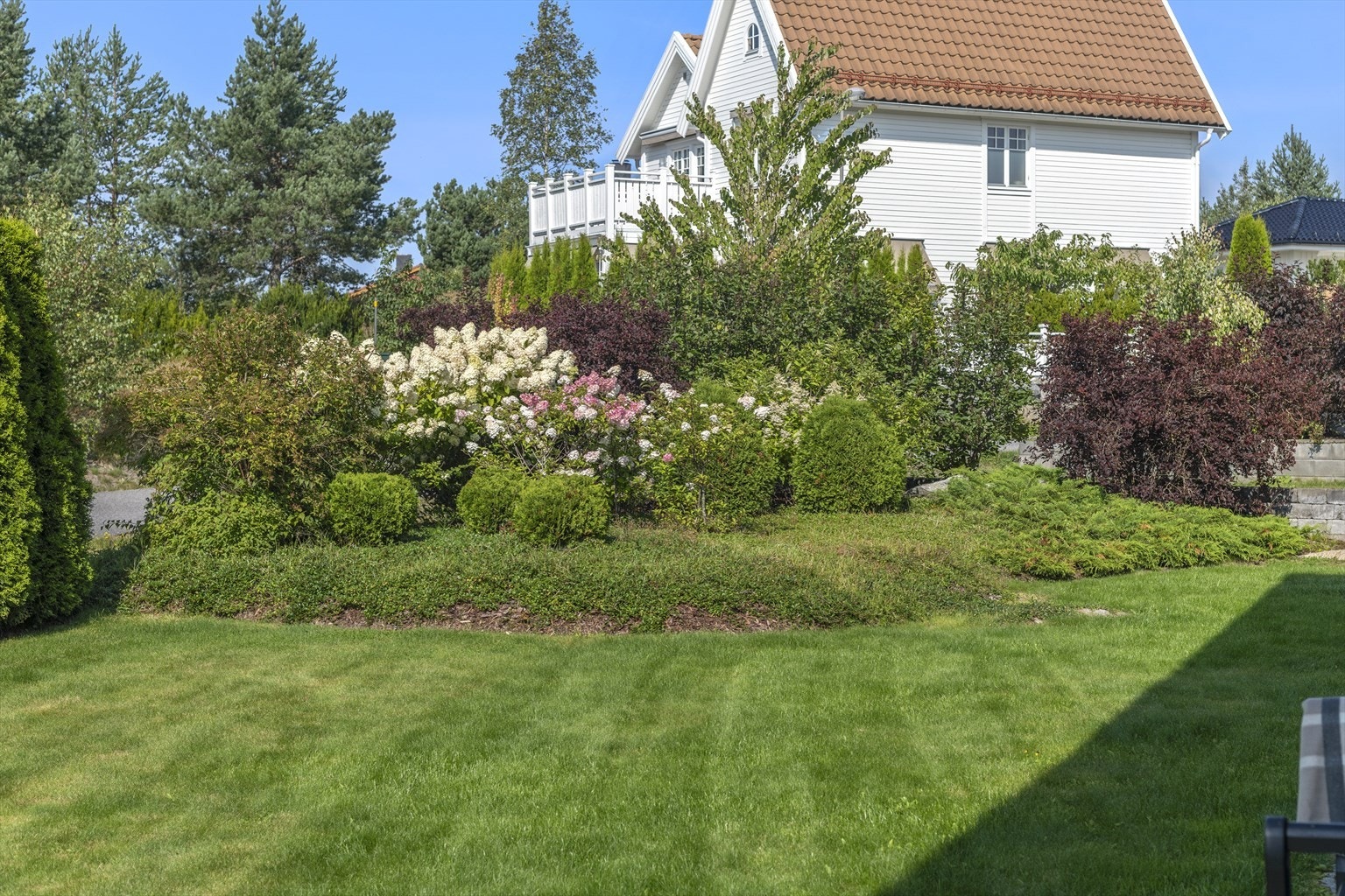 Velstelt hage Galleribilde