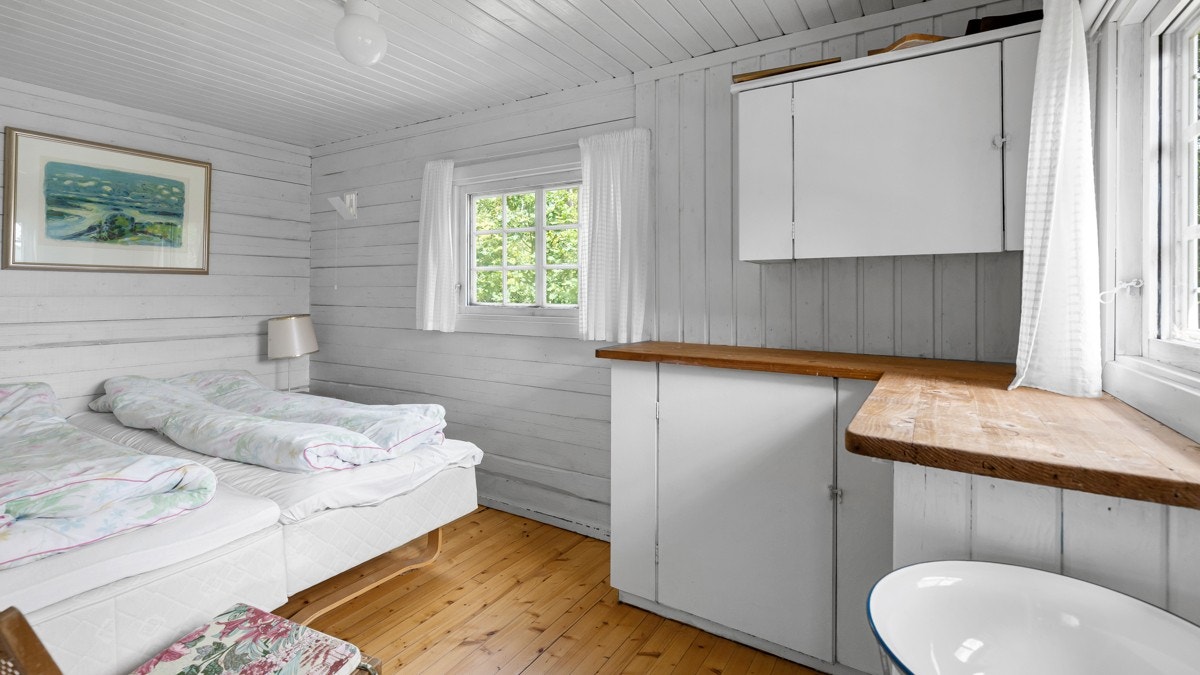 De maritime detaljene plukkes også opp i møblene, noe som gir interiøret et helhetlig, sommerlig uttrykk. Galleribilde