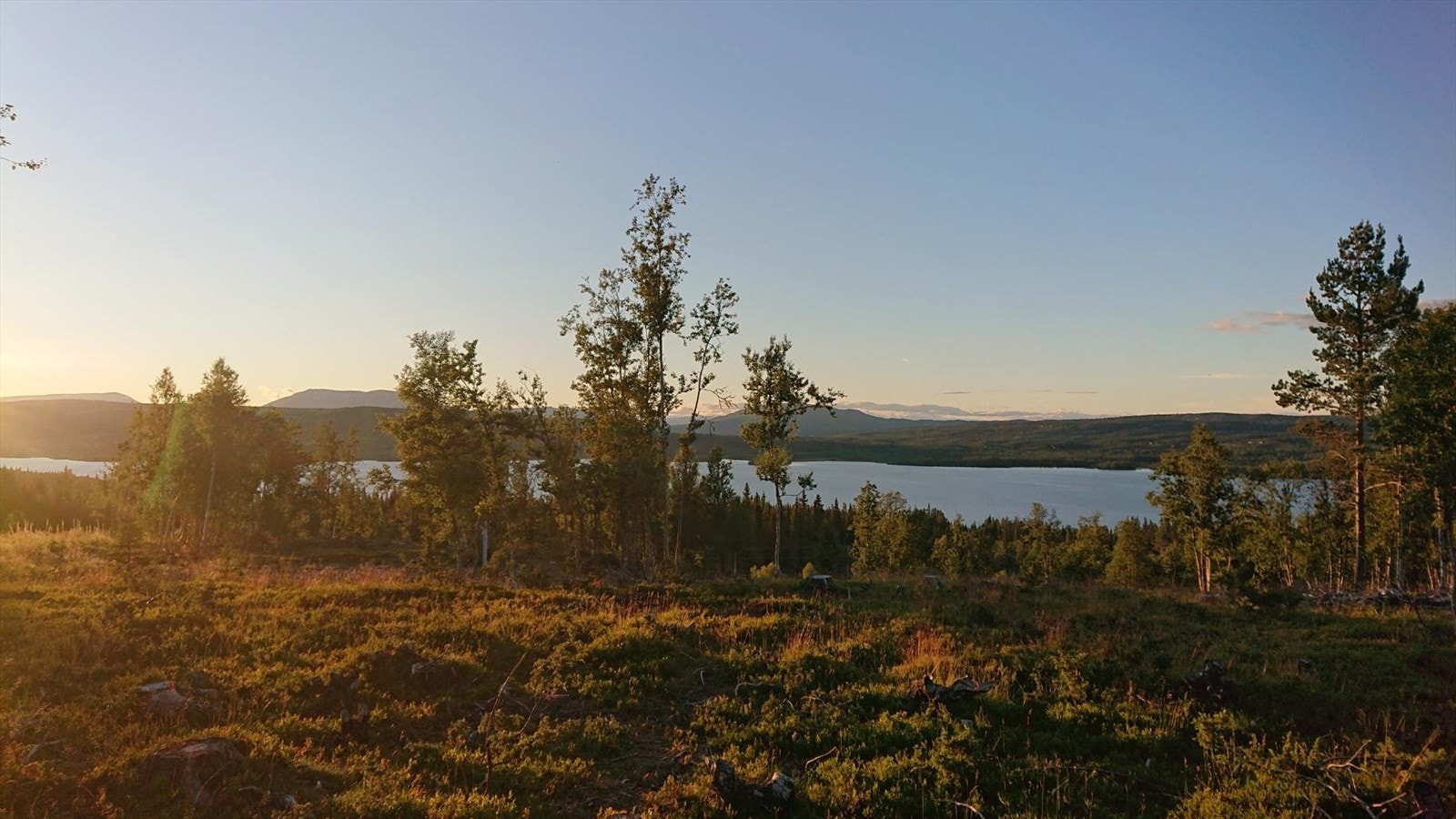 Selgers bilde. Nydelig solnedgang sett fra tomt. Galleribilde