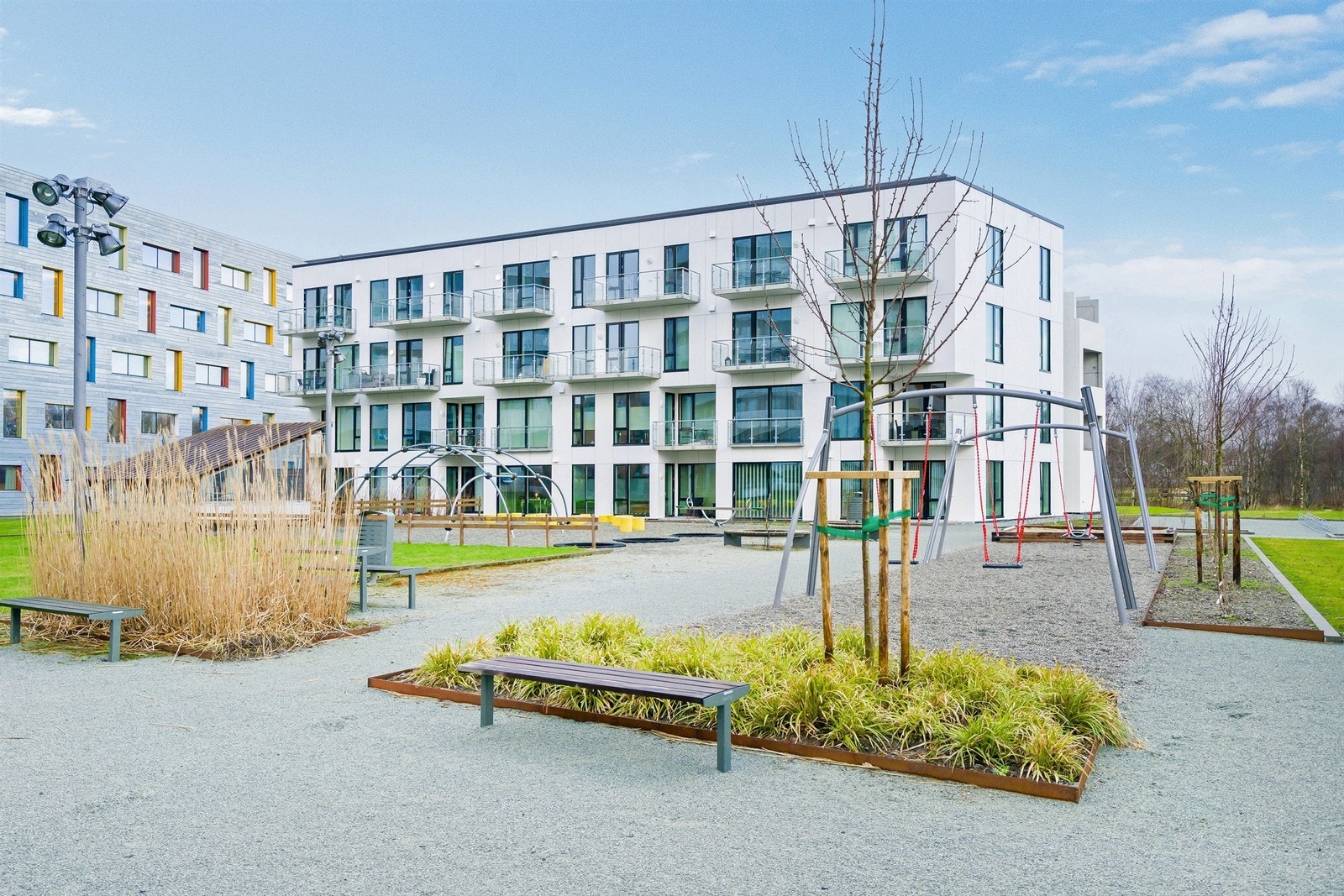 In front with a nice playground Galleribilde