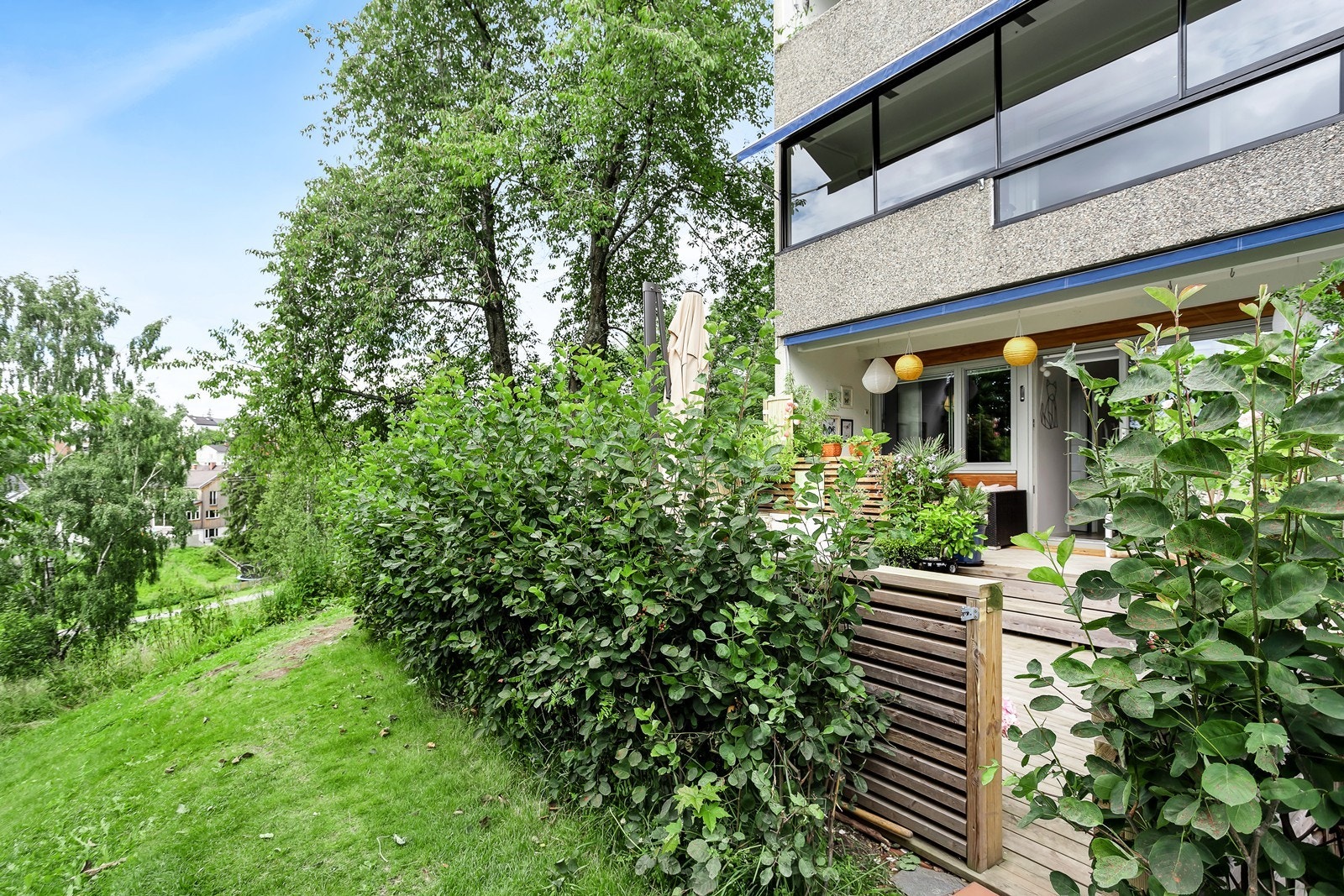 Her får du følelsen av å bo i et hus med hage Galleribilde