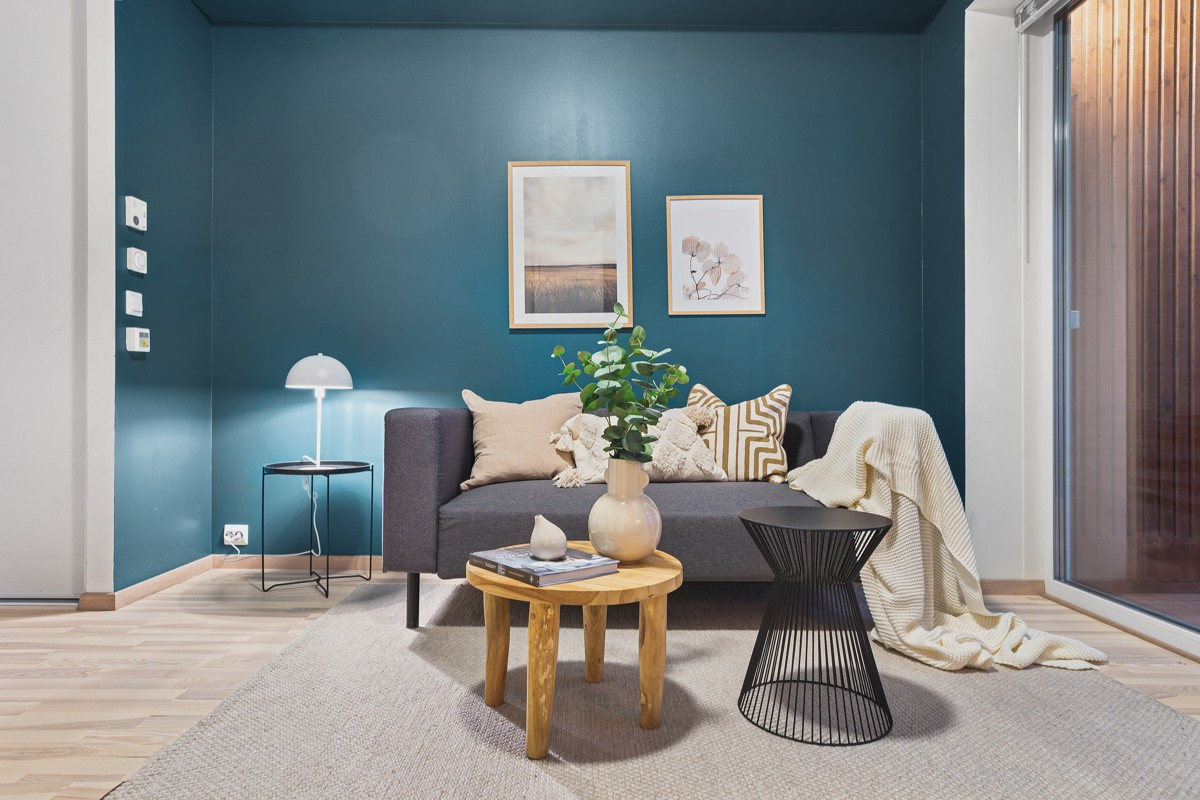 I stuen er det plass for både sofagruppe, spisebord og øvrig innredning.