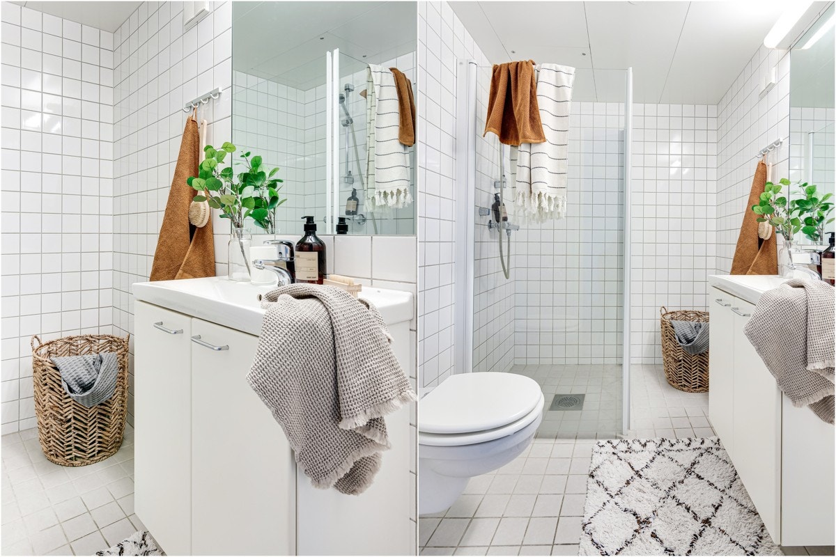 Pent flislagt baderom med gulvvarme, innfellbare dusjdører samt opplegg og plass til både vaskemaskin og tørketrommel. Galleribilde