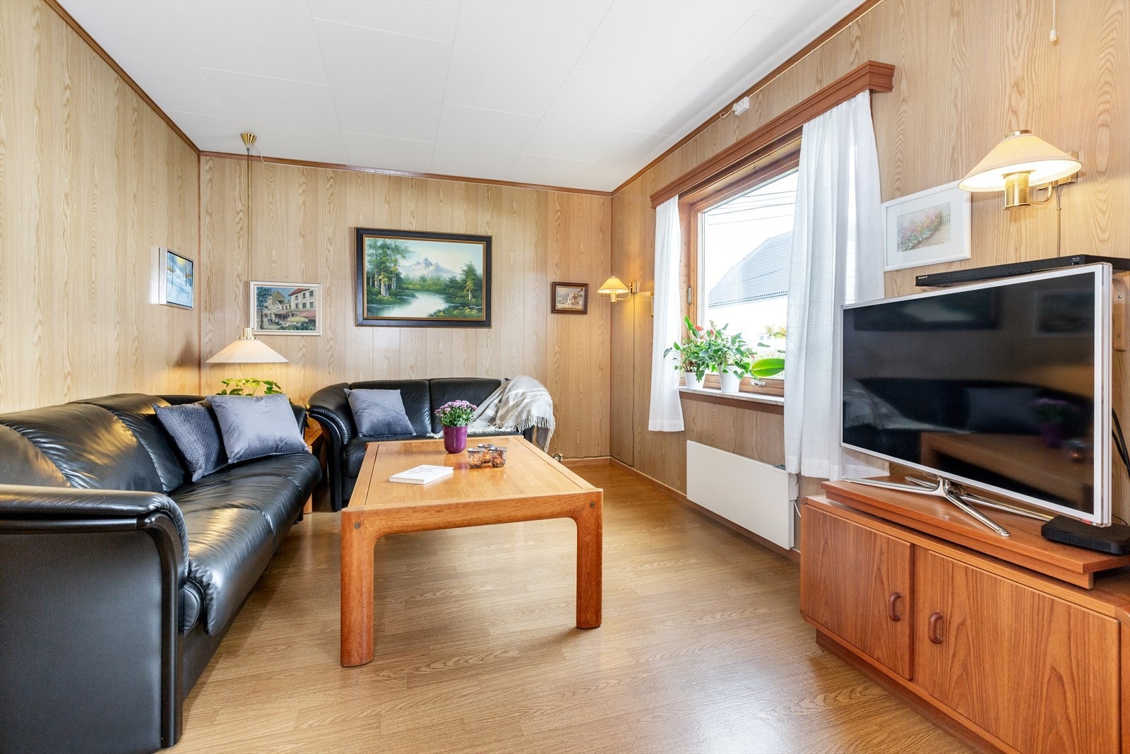 En koselig TV-stue. Galleribilde