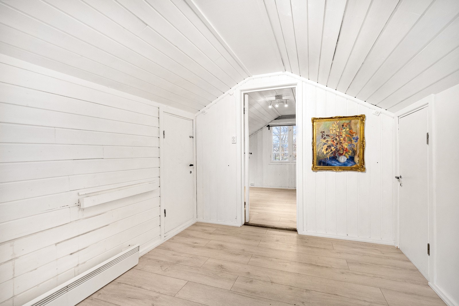 Lyst og hyggelig loft. Galleribilde