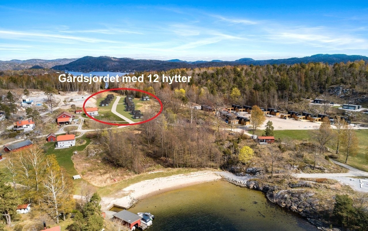 Tomteområde Gårdsjordet sett med stranda i forkant Galleribilde