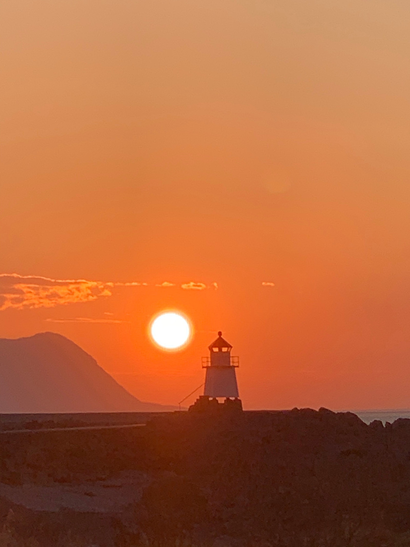 Fyret i solnedgang Galleribilde