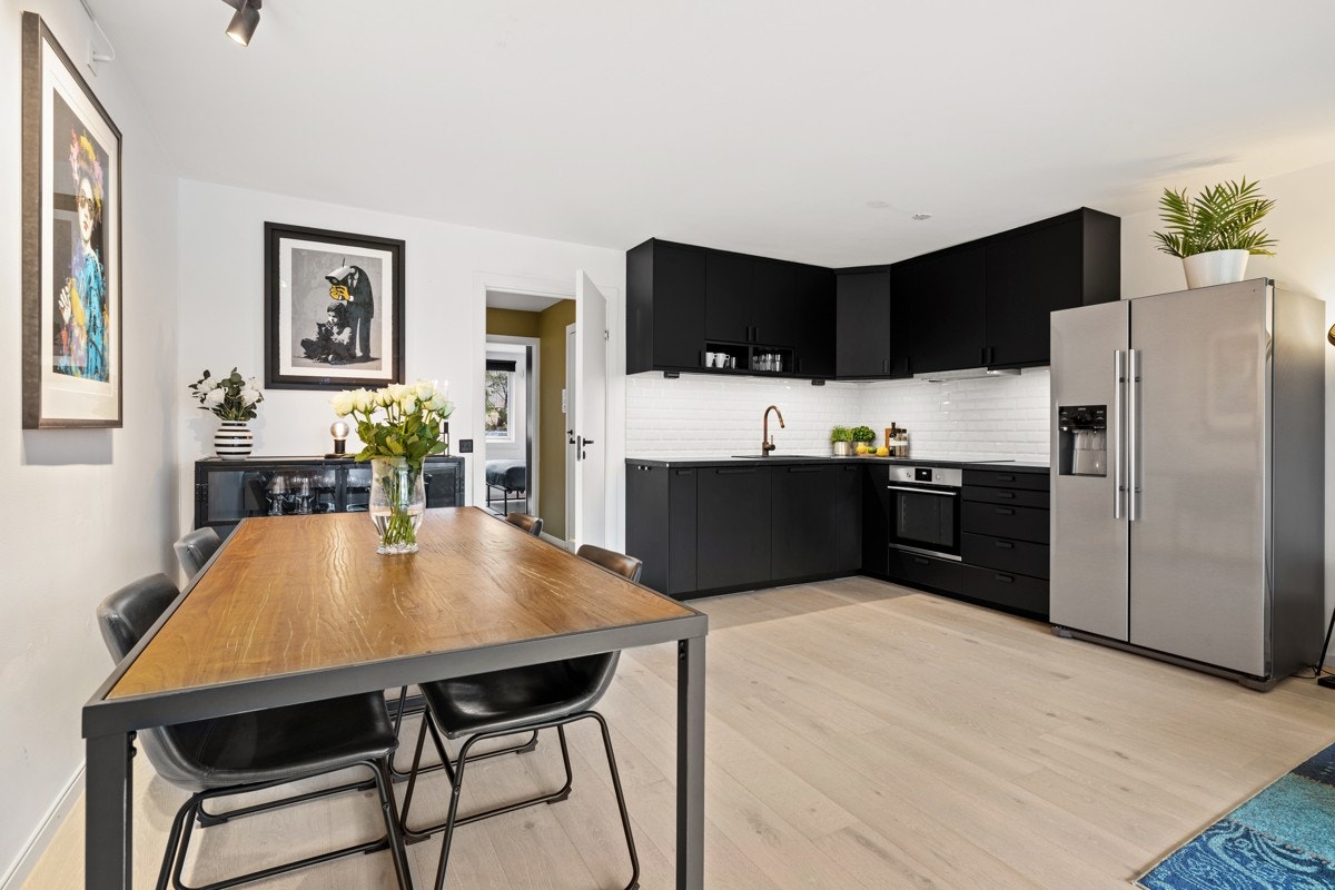 Hold gjestene dine med selskap mens du lager mat. Galleribilde