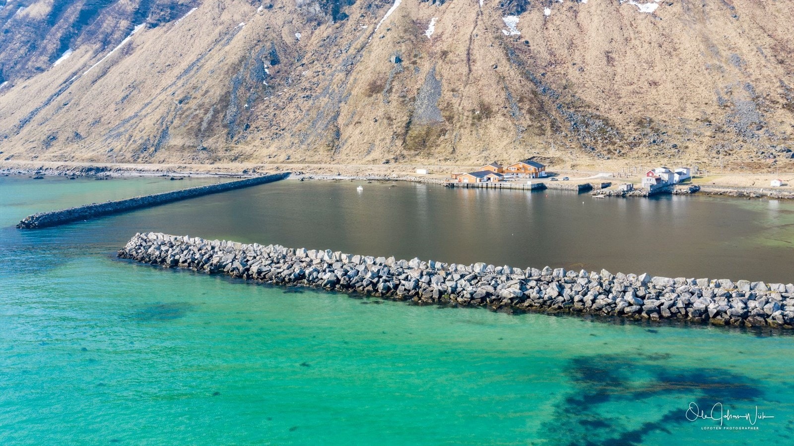 Moloen som skjermer mot vær og vind. Galleribilde