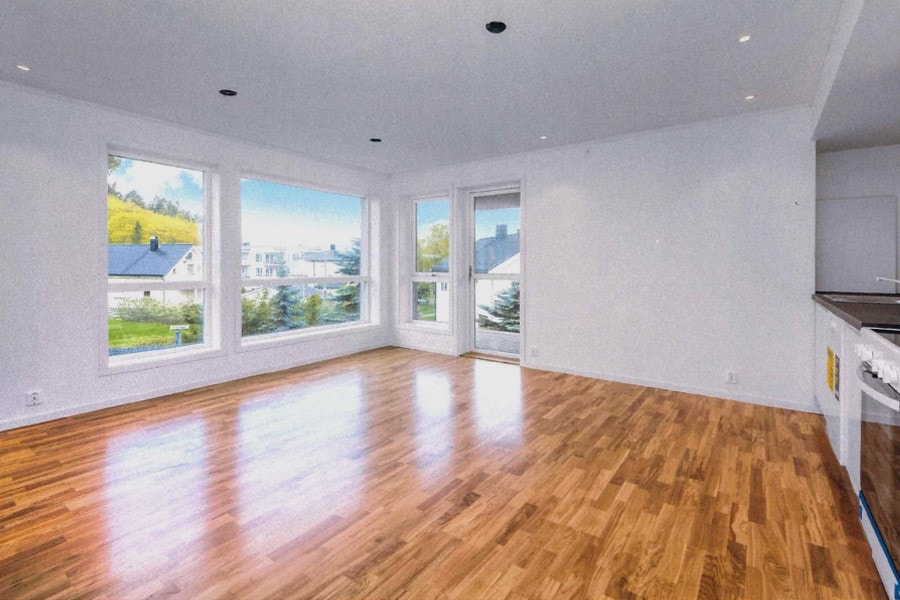 Stue med kjøkken (slik den ser ut uten møbler). Galleribilde