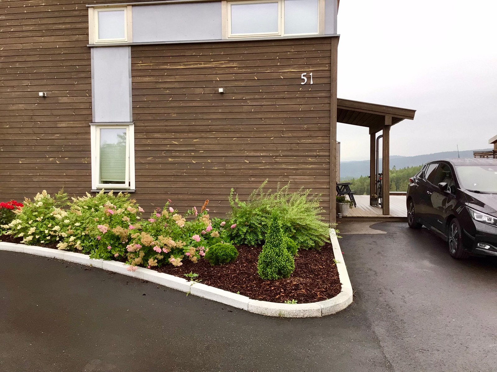 Mot biloppstillingsplass utleiedel. Galleribilde