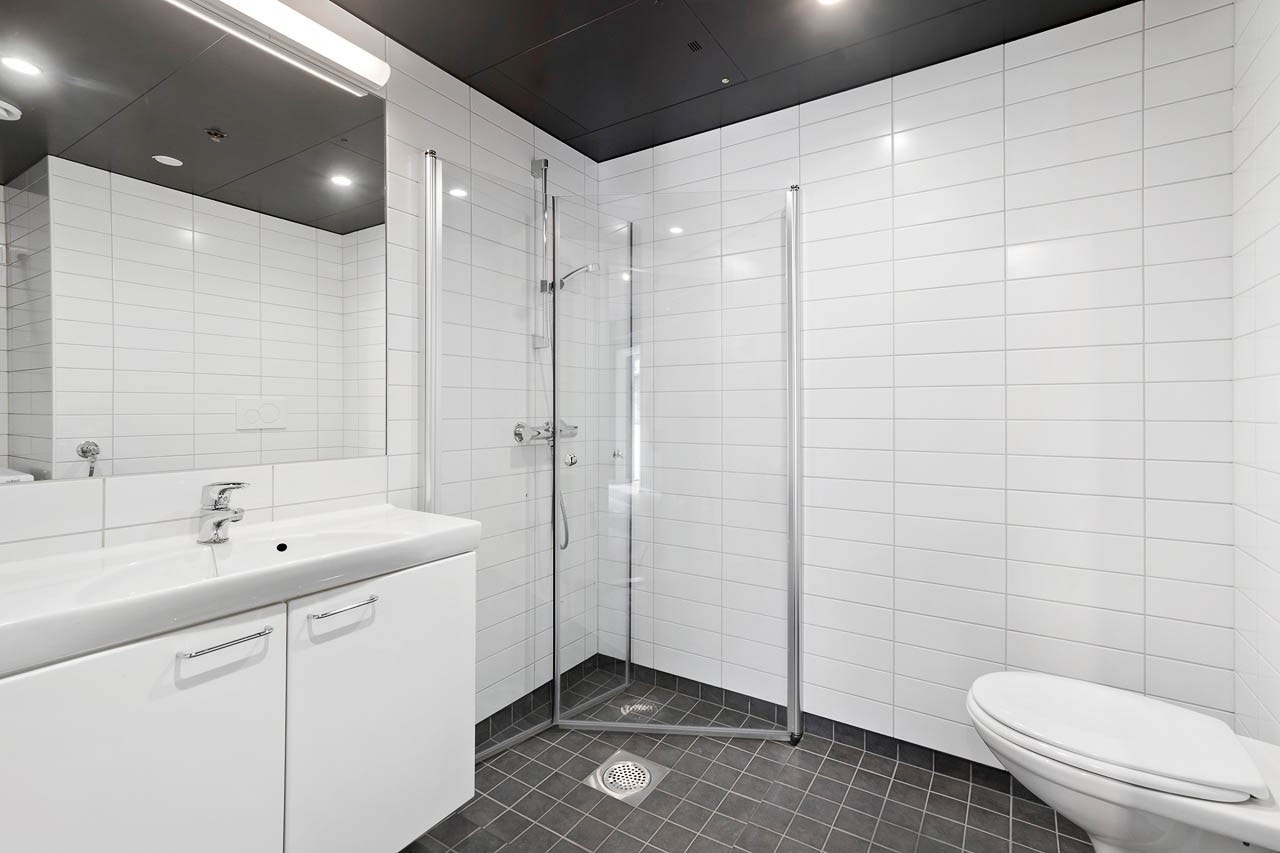 Flislagt bad med gulvvarme Galleribilde