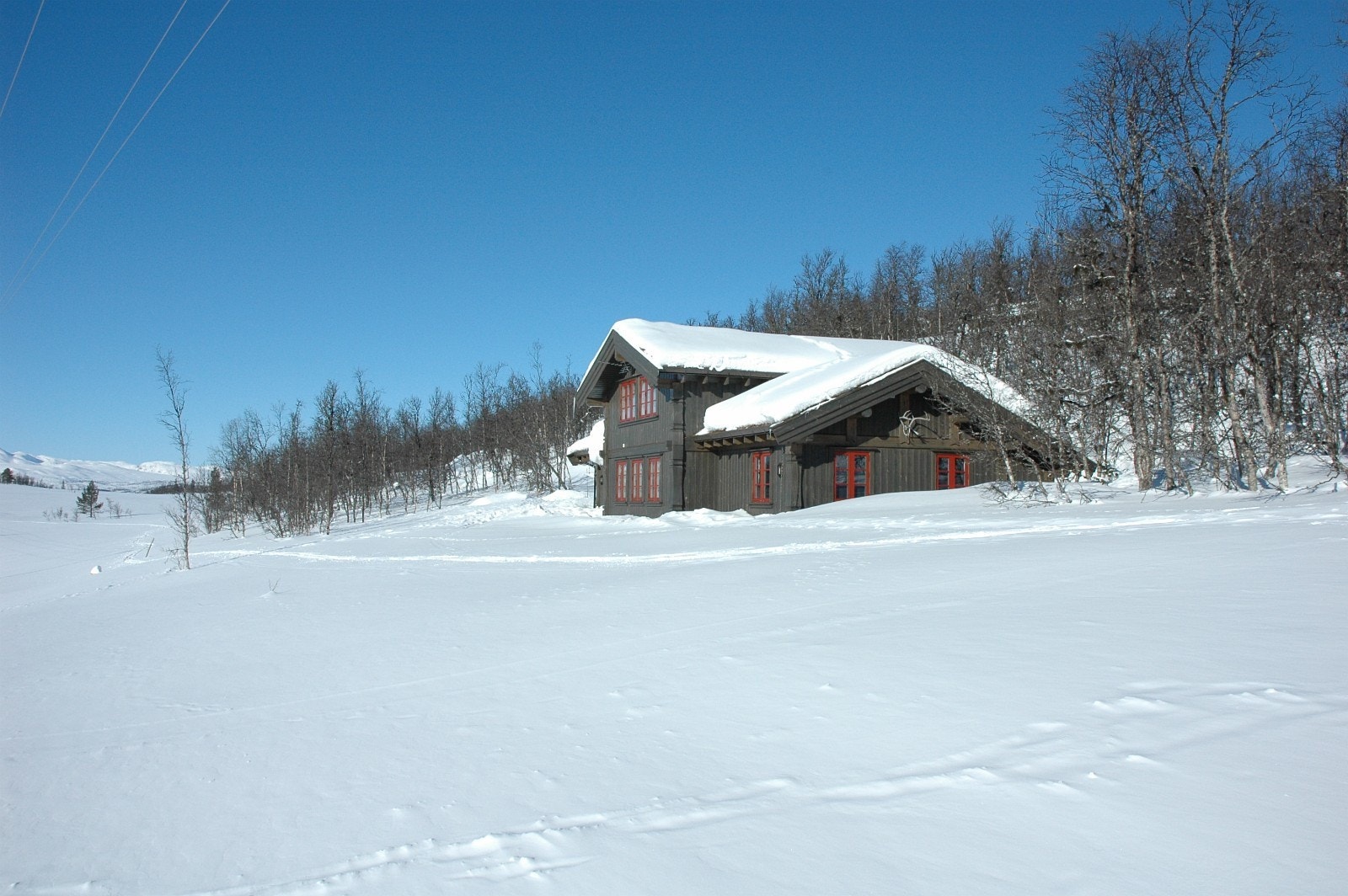 Stavlaft-hytte ved nederste tomter i Bjønnskarhaugen Vest. Galleribilde
