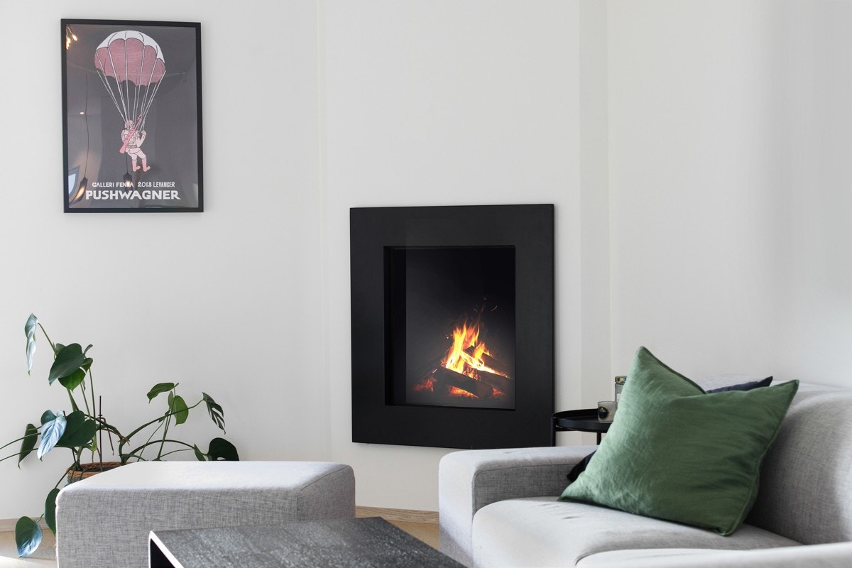 Som ekstra oppvarmingskilde har stuen en stilig gasspeis. Galleribilde