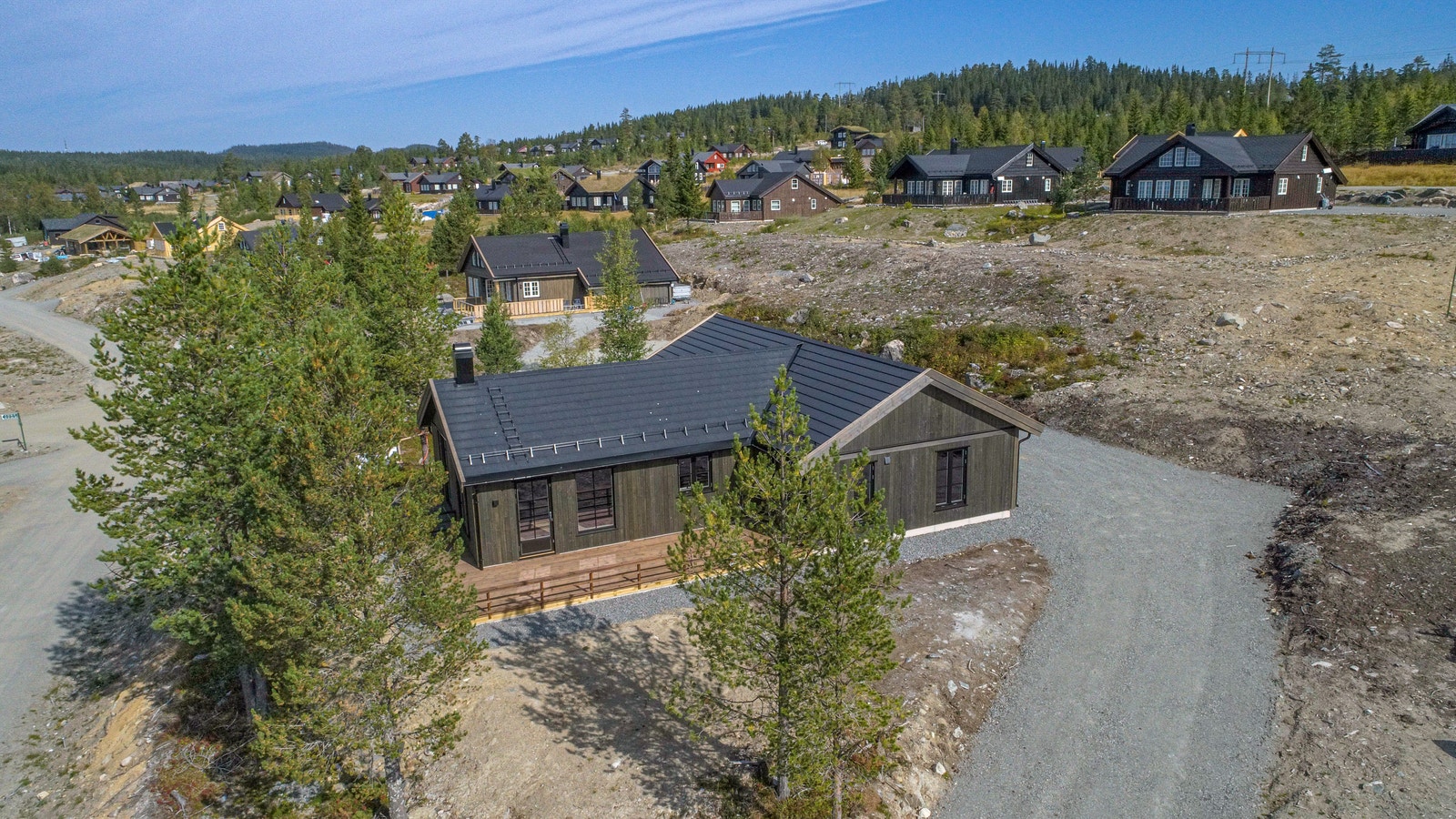 Plassering hytte i nabolaget. Galleribilde