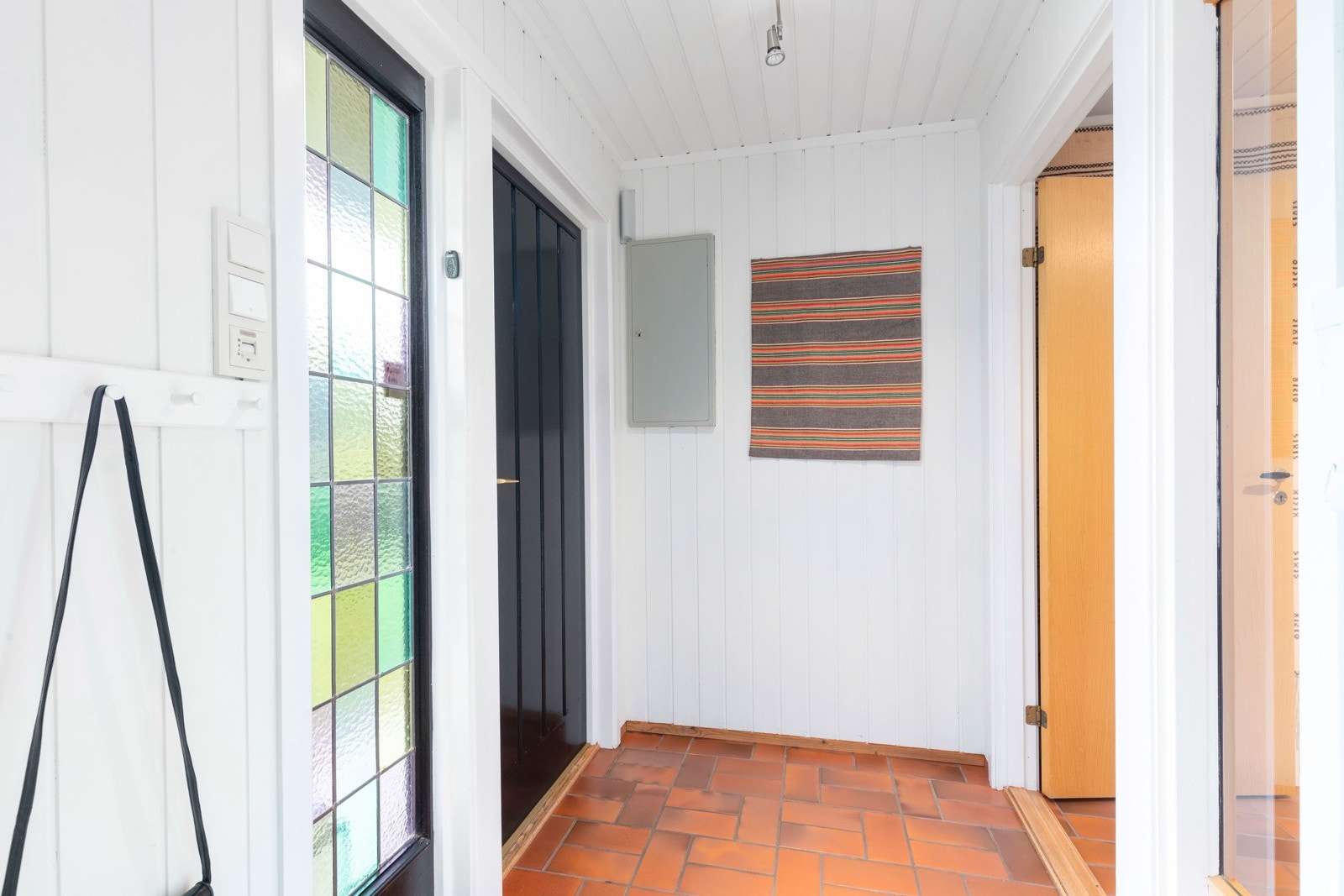 Så går vi ned. Hyggelig vindfang Galleribilde