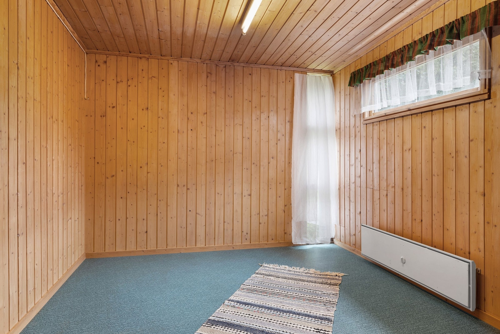 Innvendig bod ved inngangsparti Galleribilde