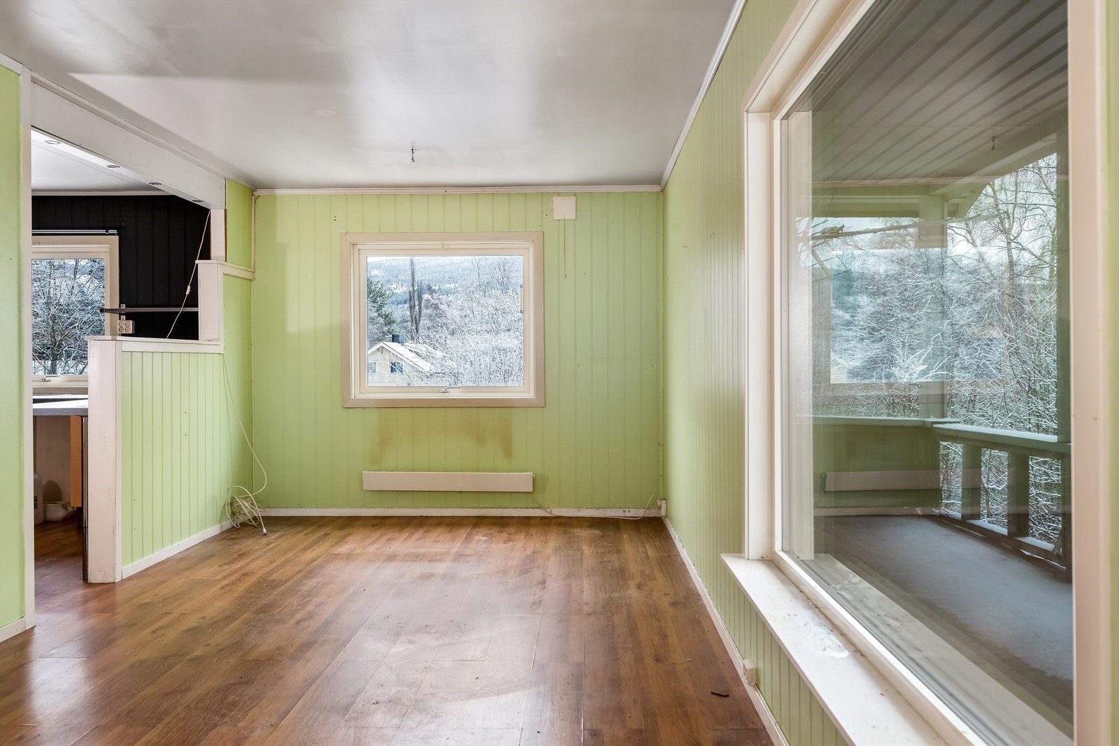 Oppvarming med panelovn i tillegg til vedovn Galleribilde