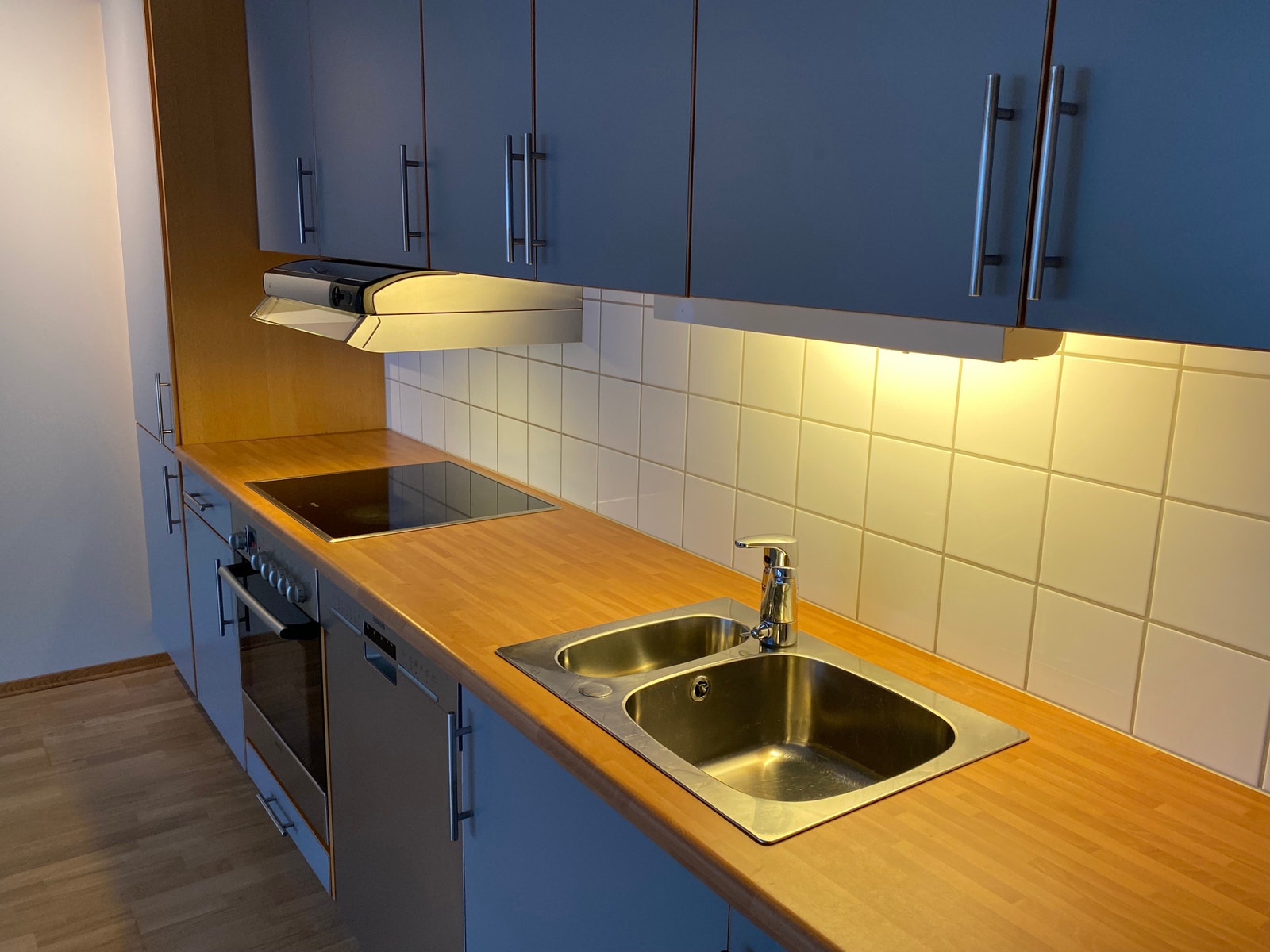 Lekker kjøkkeninnredning skaper hyggelig miljø Galleribilde