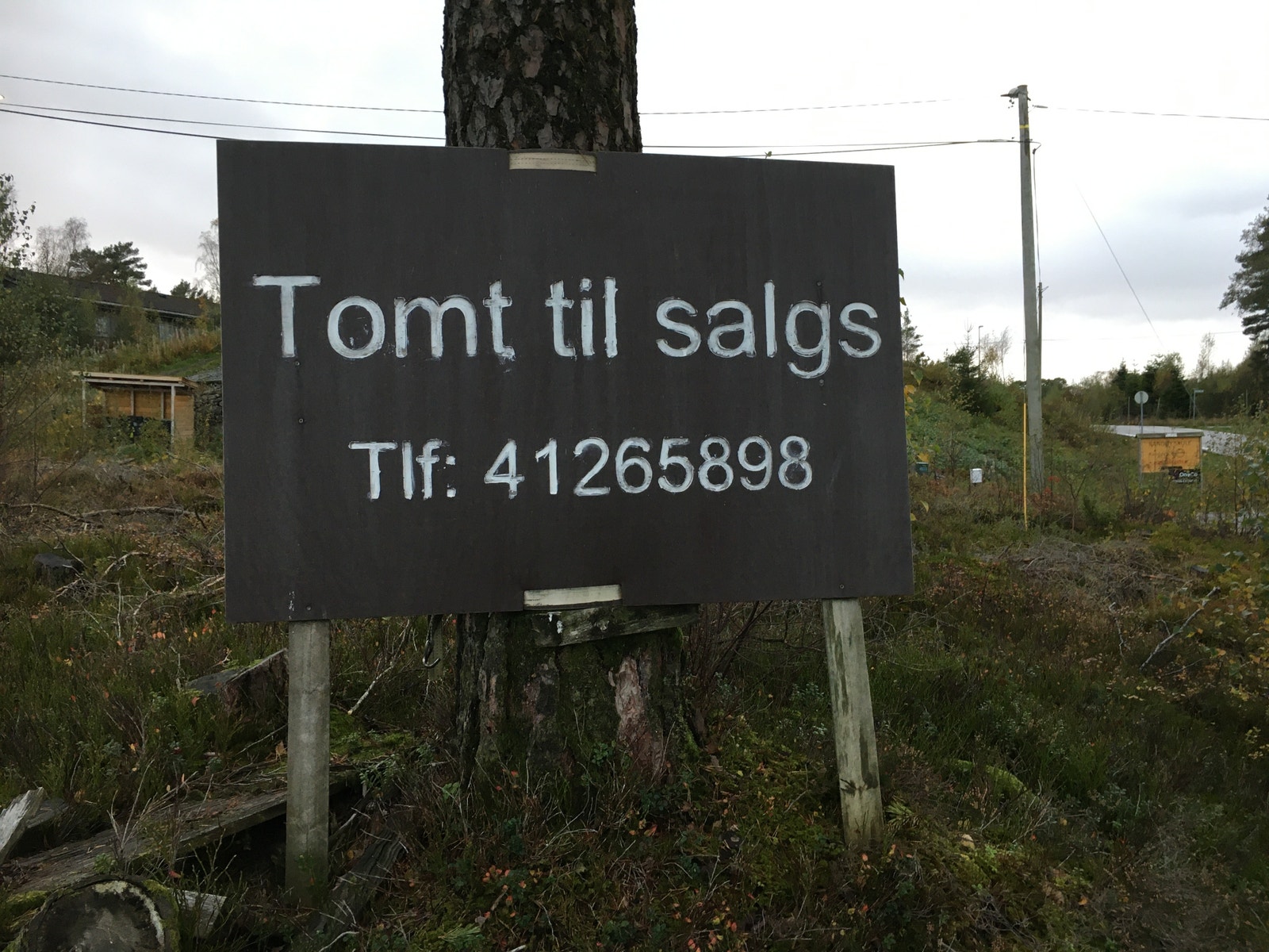 Skilt på tomt Galleribilde