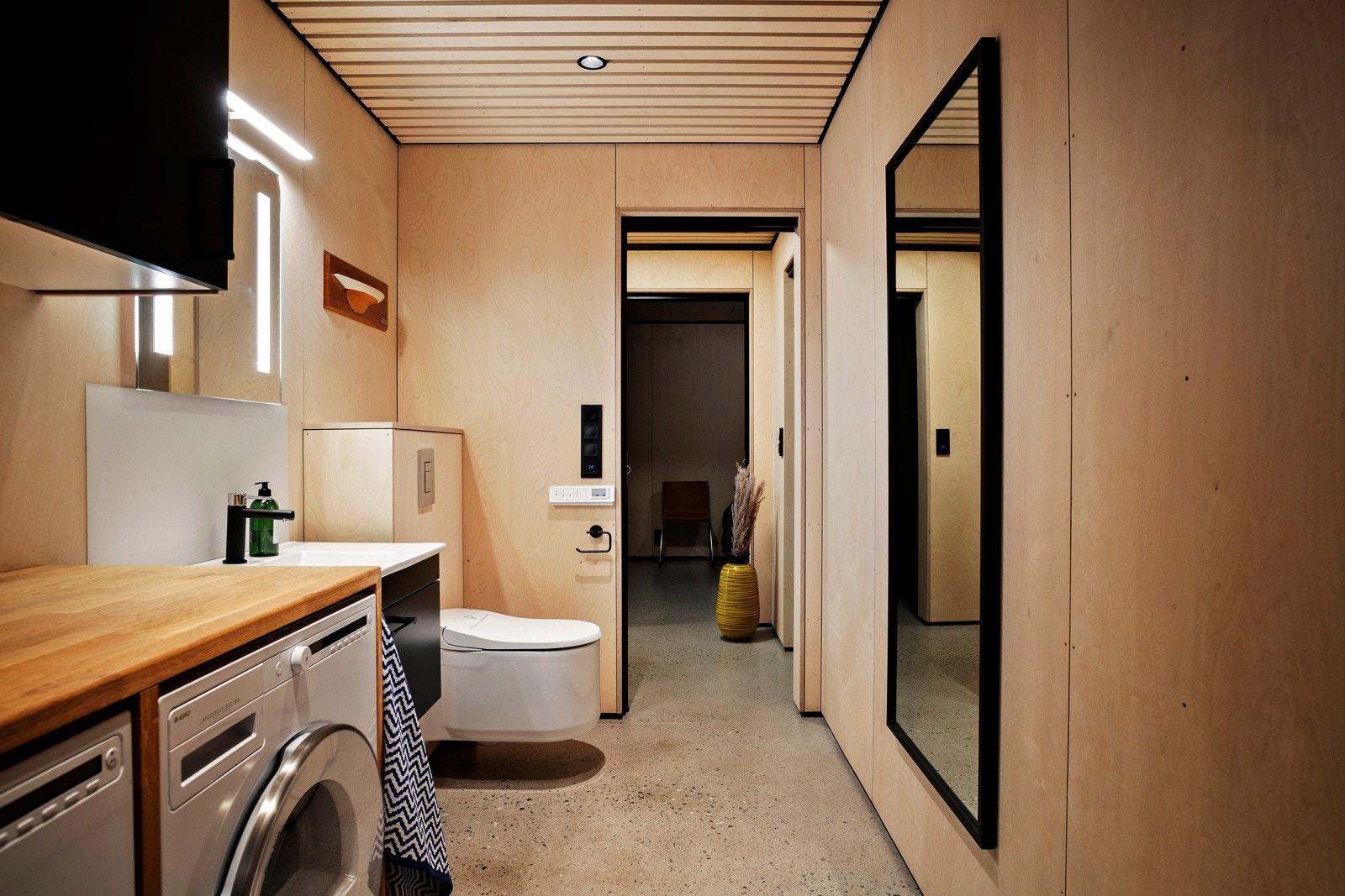 Opplegg til vaskemaskin og tørketrommel på badet Galleribilde