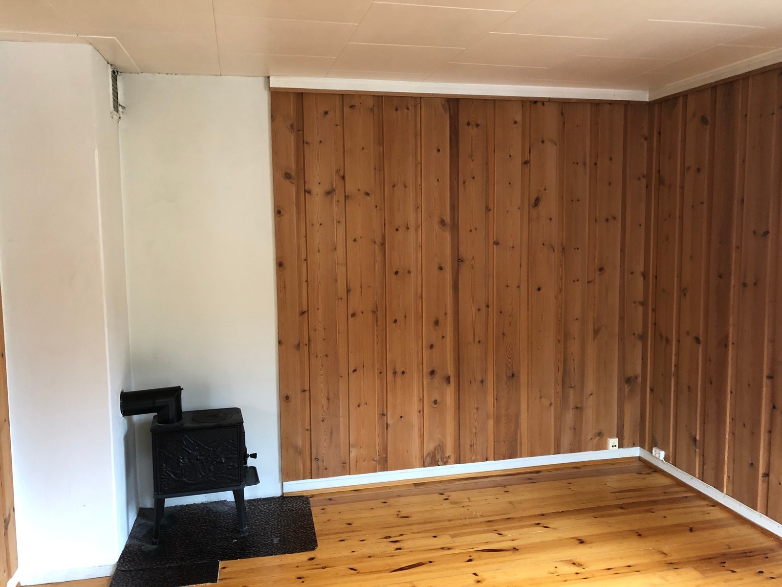 Stue 2 med vedovn Galleribilde