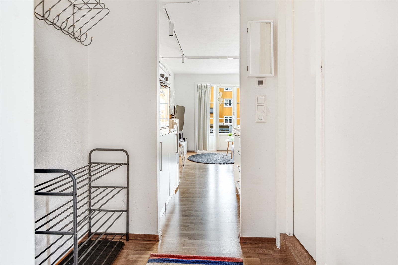 Du blir ønsket velkommen inn i gang Galleribilde