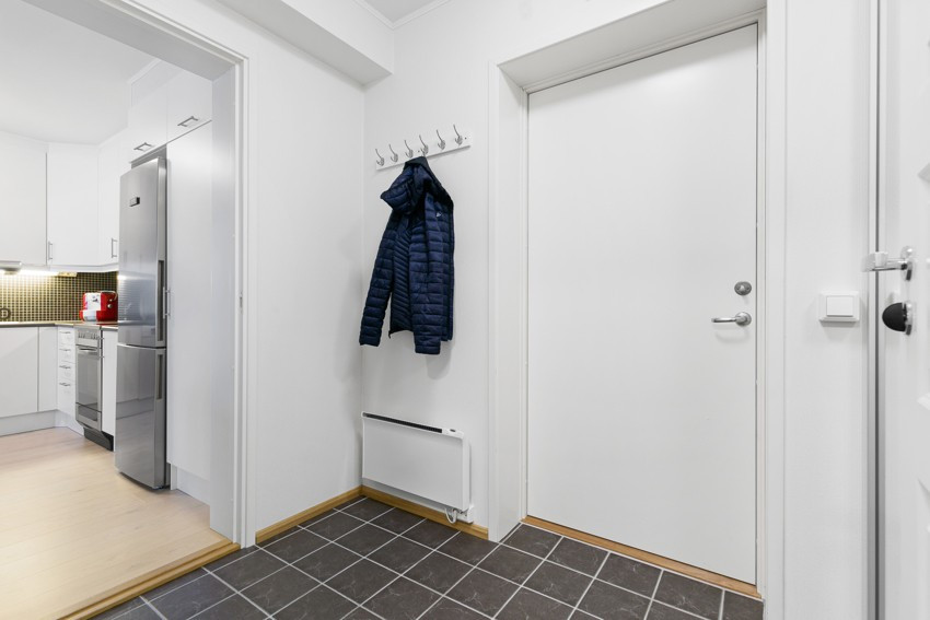 Gang/Entrè med stor skyvedørsgarderobe.
