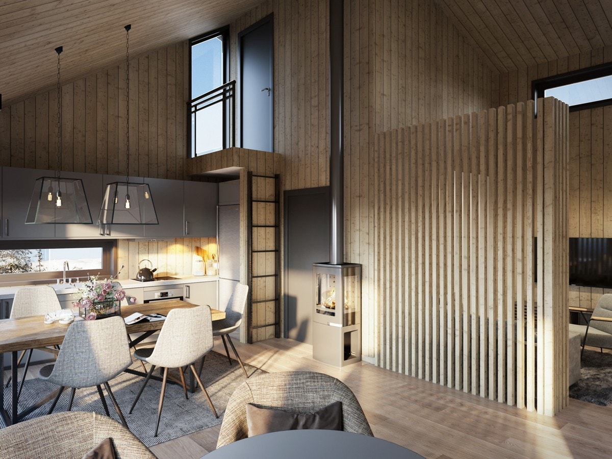 Loftetasjen gir luft og dybde til kjøkken og stue, og sonene gir rom for egentid og familietid. Verdt å merke seg at en kompakt hytte ikke betyr liten ? med en fem meter høy himling, vil stua og kjøkken oppleves betydelig romsligere enn sine 22m2 Galleribilde