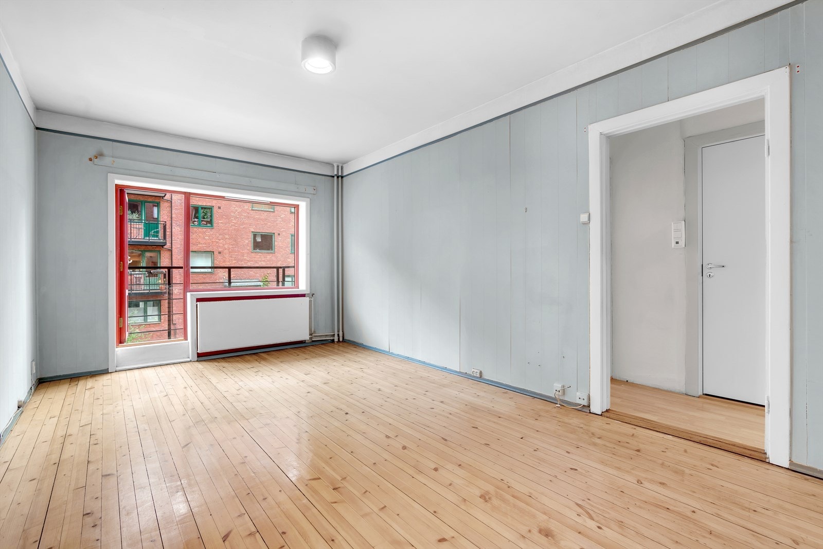 Stuen gir adkomst til balkong fra 2021. Galleribilde