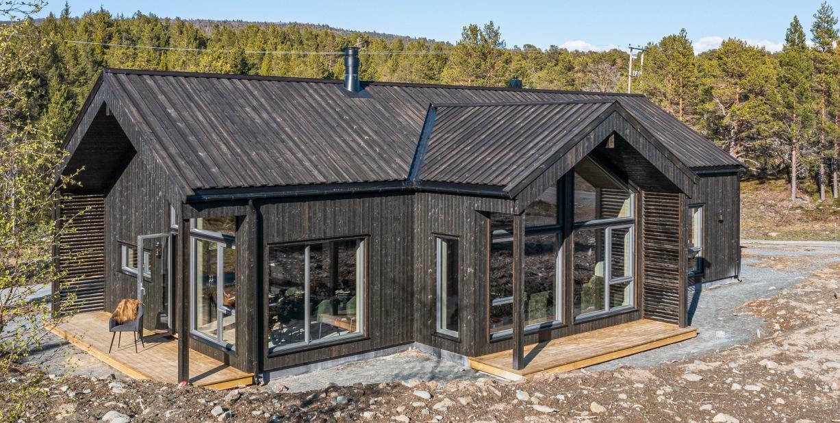 Heimdal Eiendomsmegling AS presenterer Vardamsflata 26 - En flott, nybygd hytte ved inngangen til Gjevilvassdalen. Galleribilde