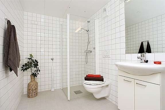 Bad med vaskemaskin Galleribilde