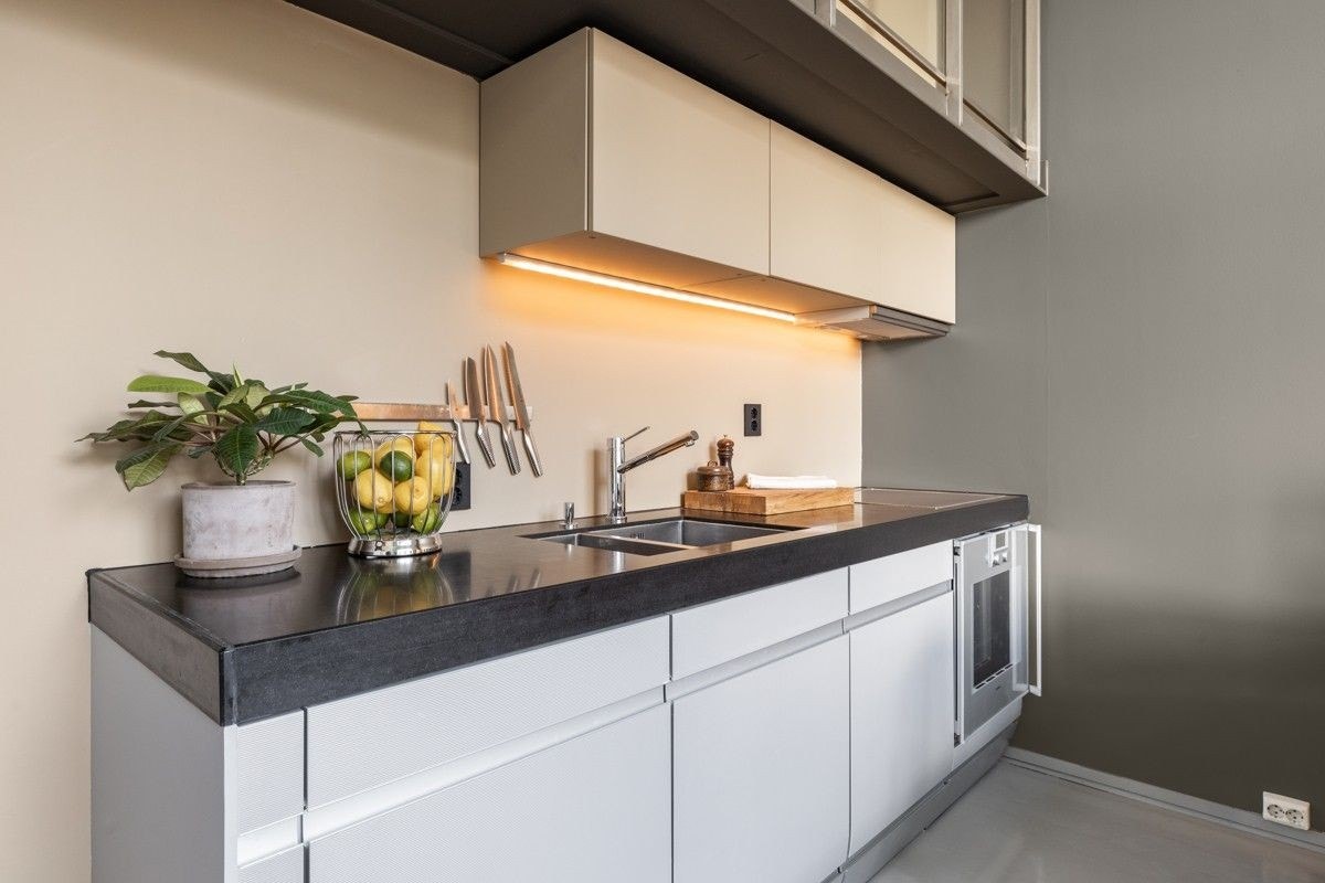Moderne kjøkken fra Gaggenau med arbeitsplate i sten/modern top quality kitchen from Gaggenau with stone countertops Galleribilde