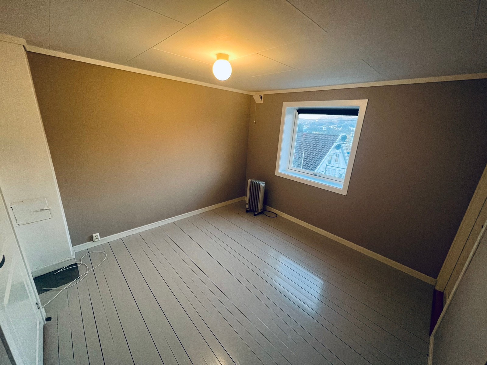 Koselig stue med utsikt mot sentrum Galleribilde