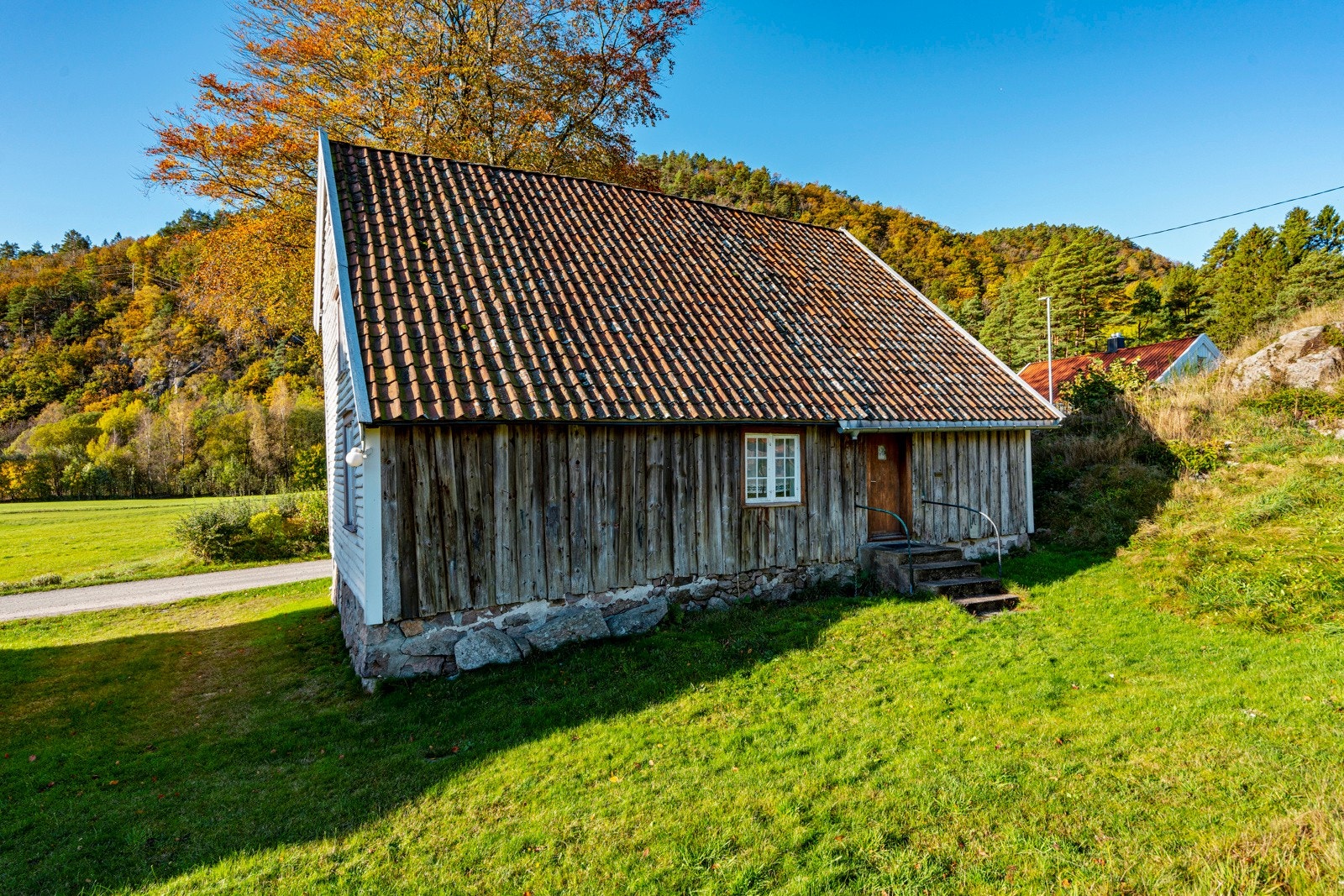 Bolighusets inngangsparti som er fredet Galleribilde