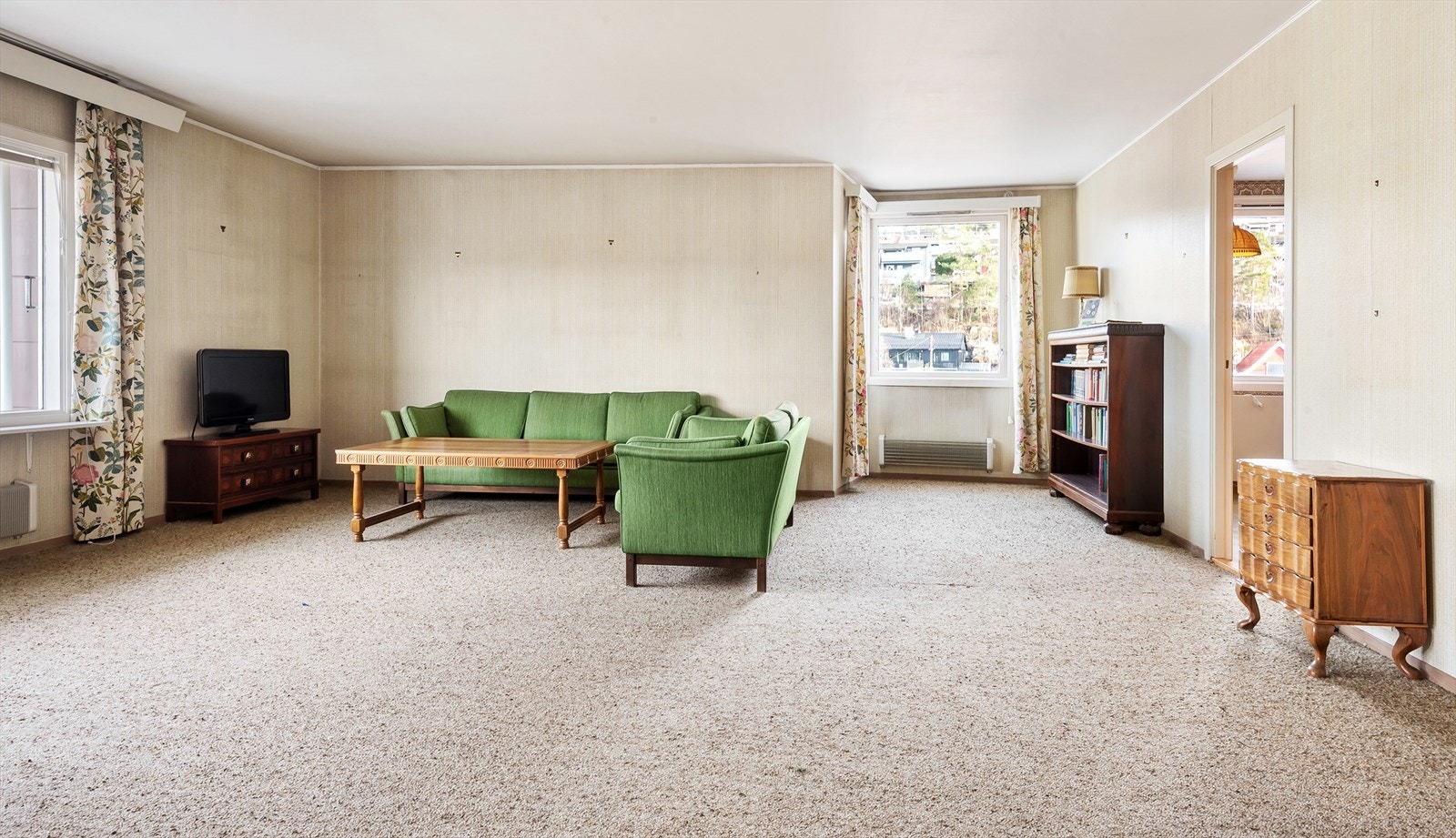 Leiligheten har egen karnapp i hjørnet på stuen. Galleribilde