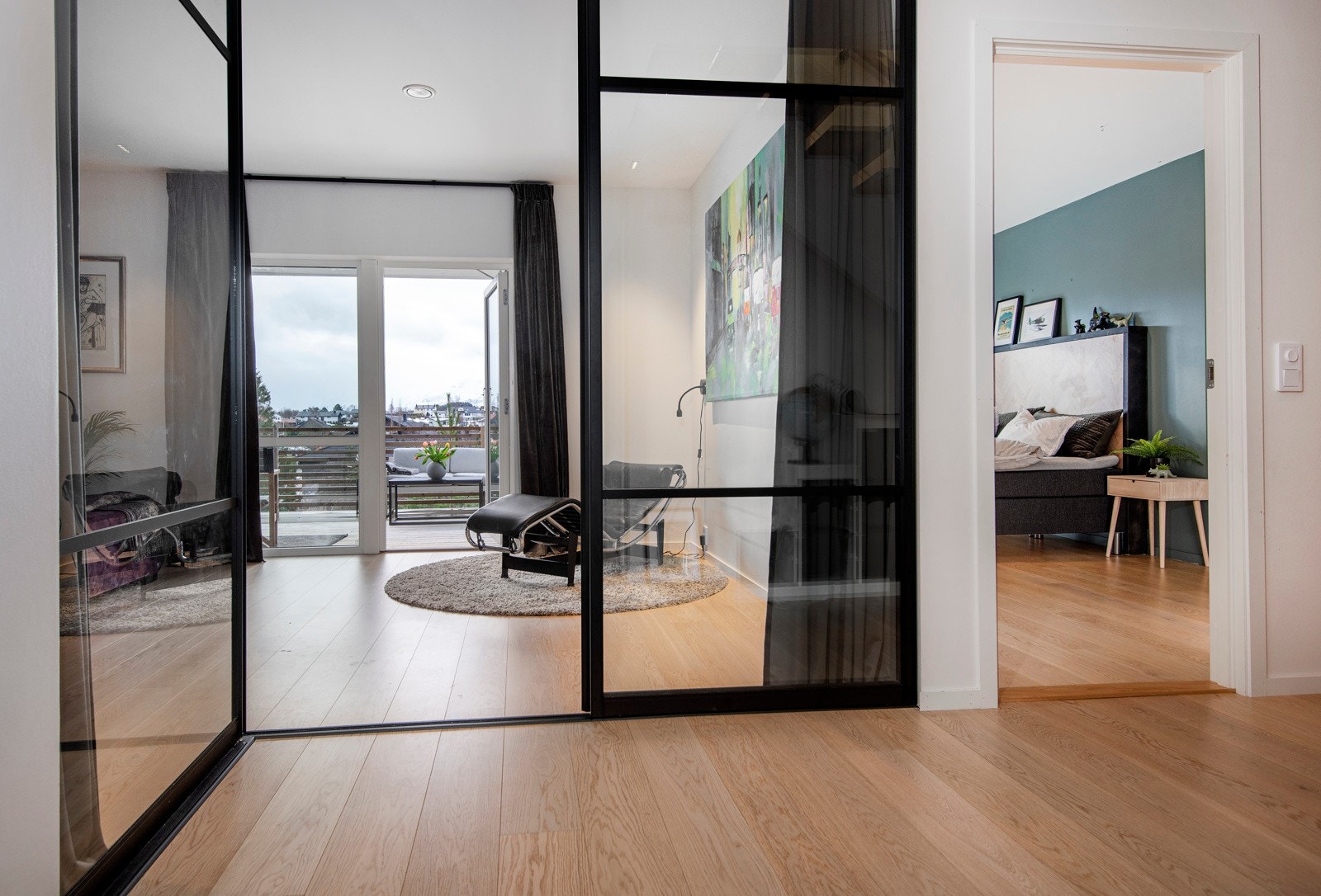 Romskiller, som gjør at rommet både kan brukes som stue og gjesterom. Galleribilde