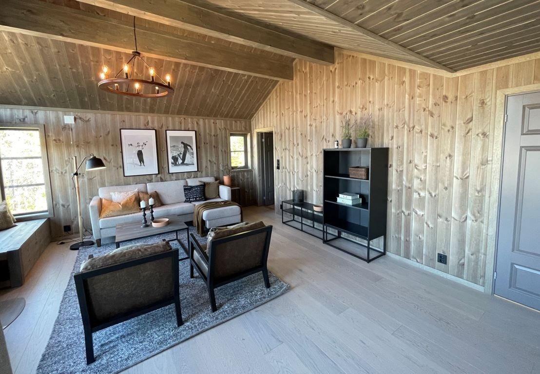 Stor og romslig stue, her fra en kundetilpasset modell. Galleribilde