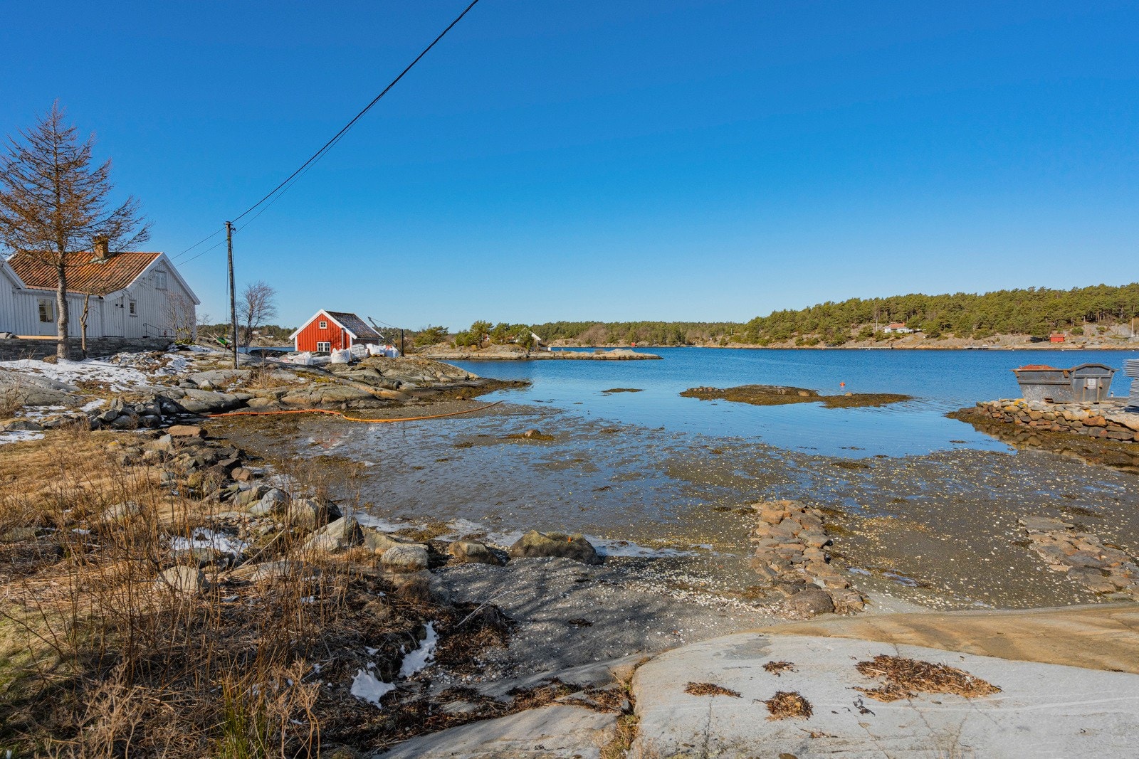 Egen bukt med naturlig strand Galleribilde
