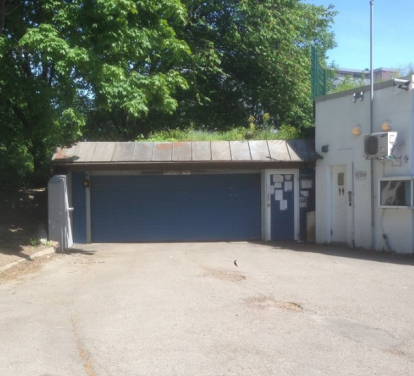 Inngang fra Suhmsgate 19 ved Shell Galleribilde