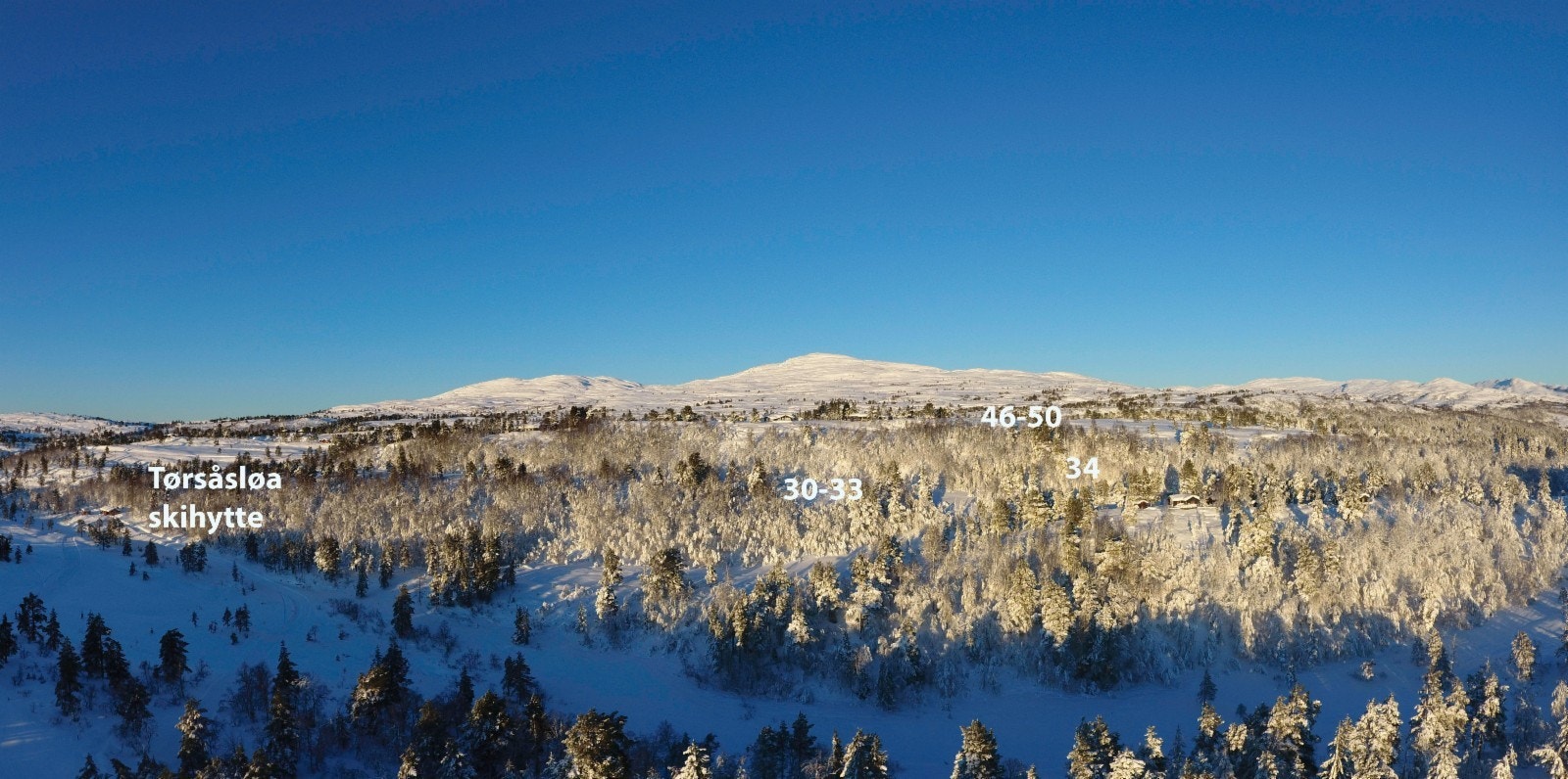 Vinterfot mot nord opp mot de nest øverst plasserte tomtene Galleribilde