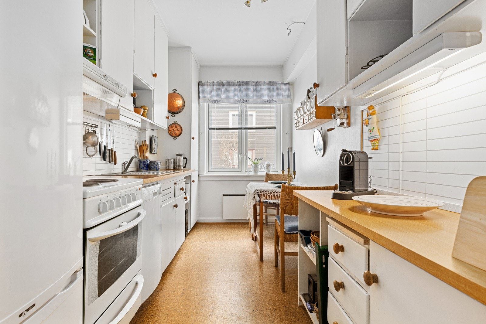 Lyst og trivelig kjøkken Galleribilde