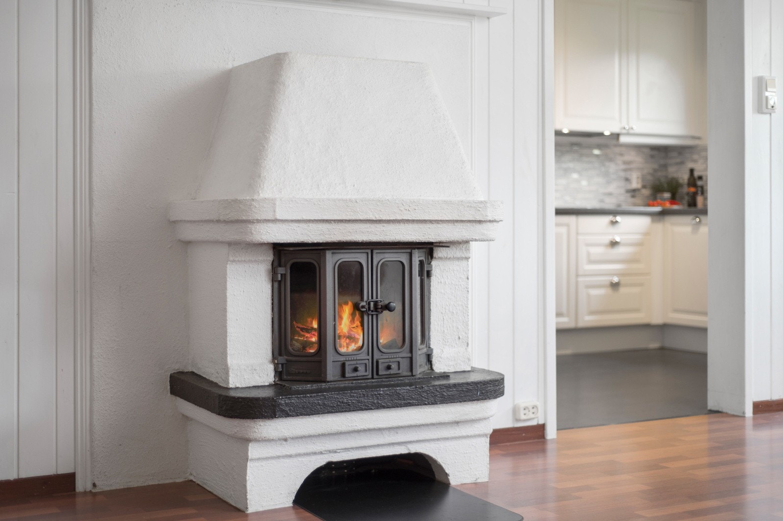 Peisovn på stue. Galleribilde