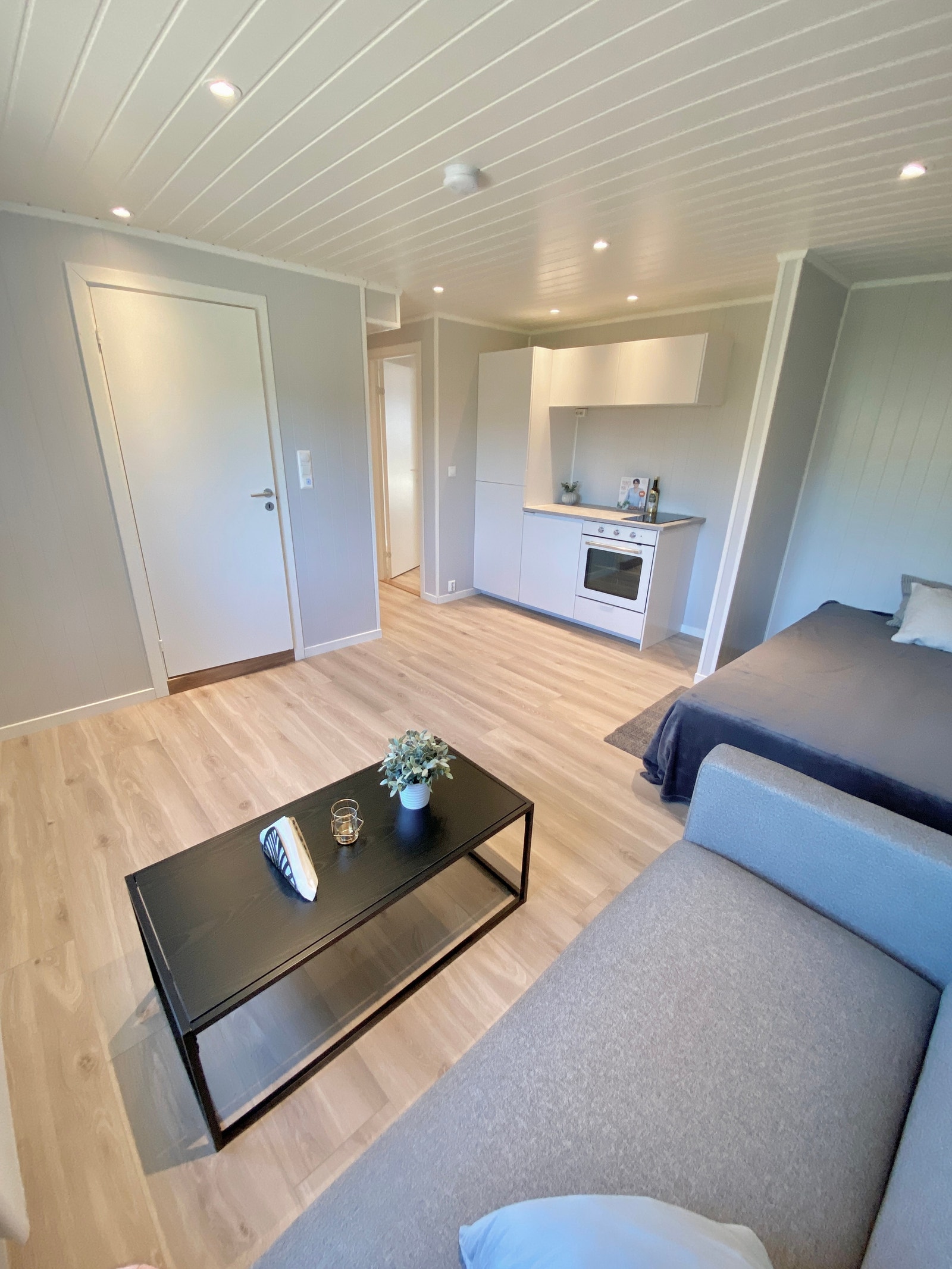 Eget bad, kjøkken og sofakrok Galleribilde